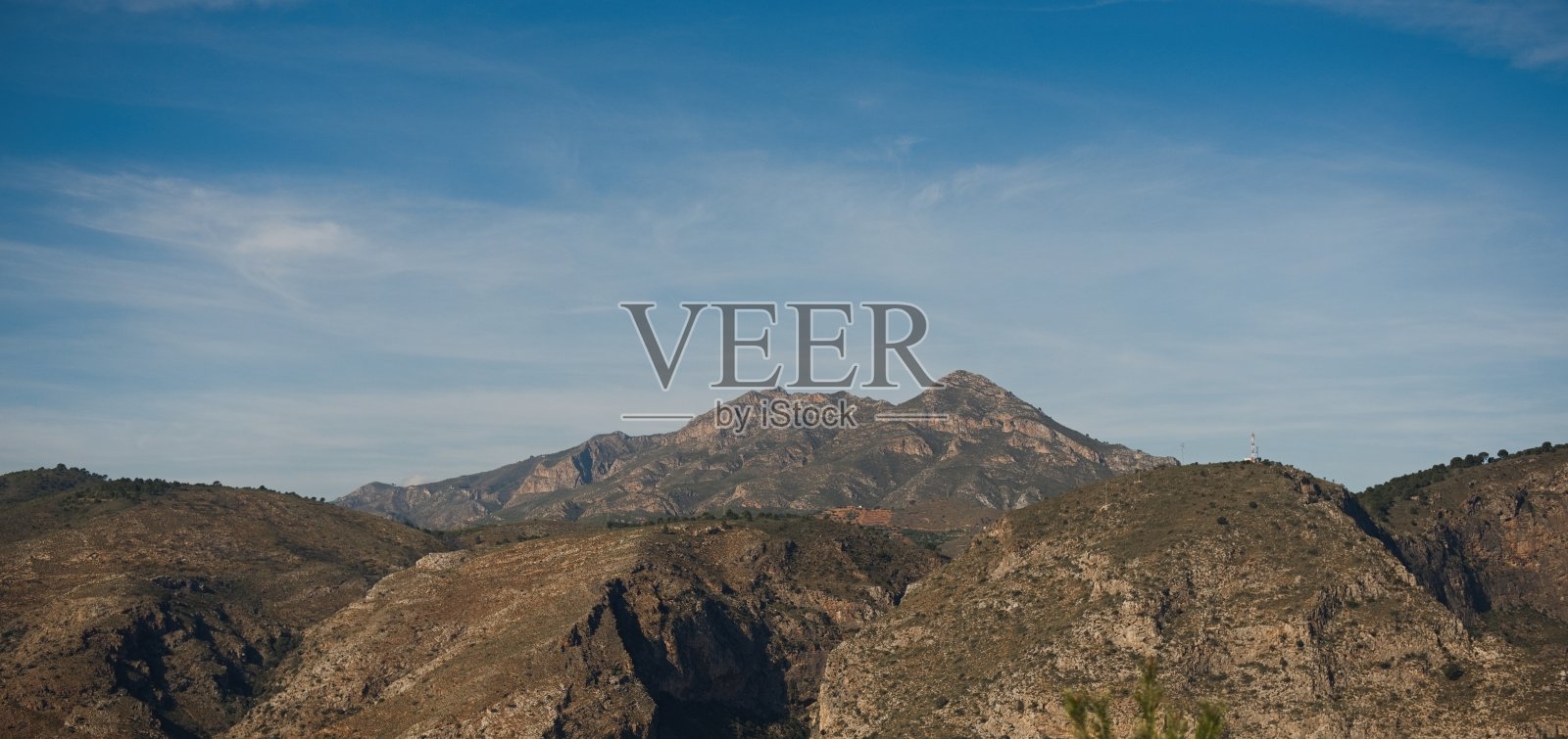 秋天的山景，棕色和黄色的山坡的山照片摄影图片