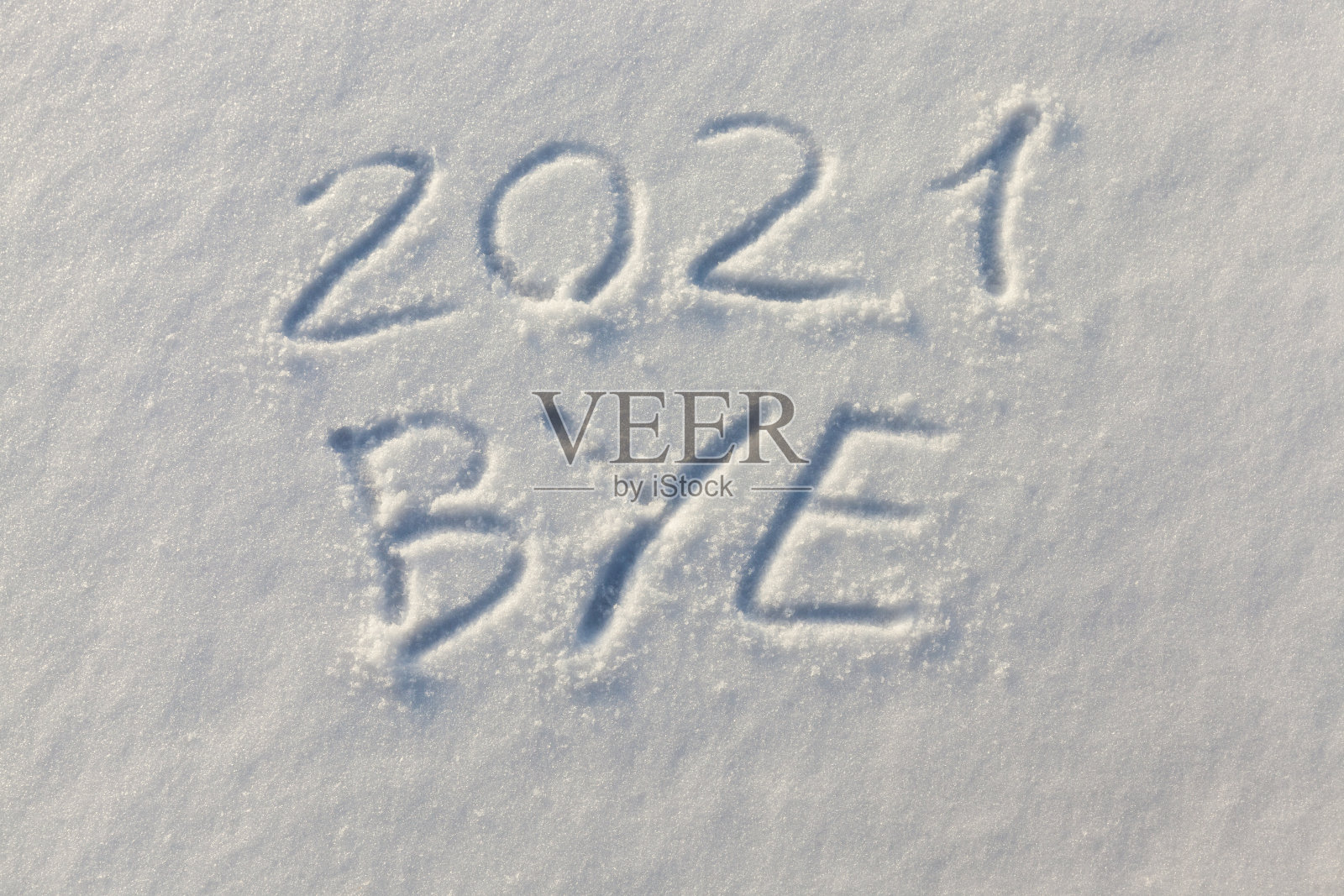 画在雪上的题词与即将到来的新年有关照片摄影图片