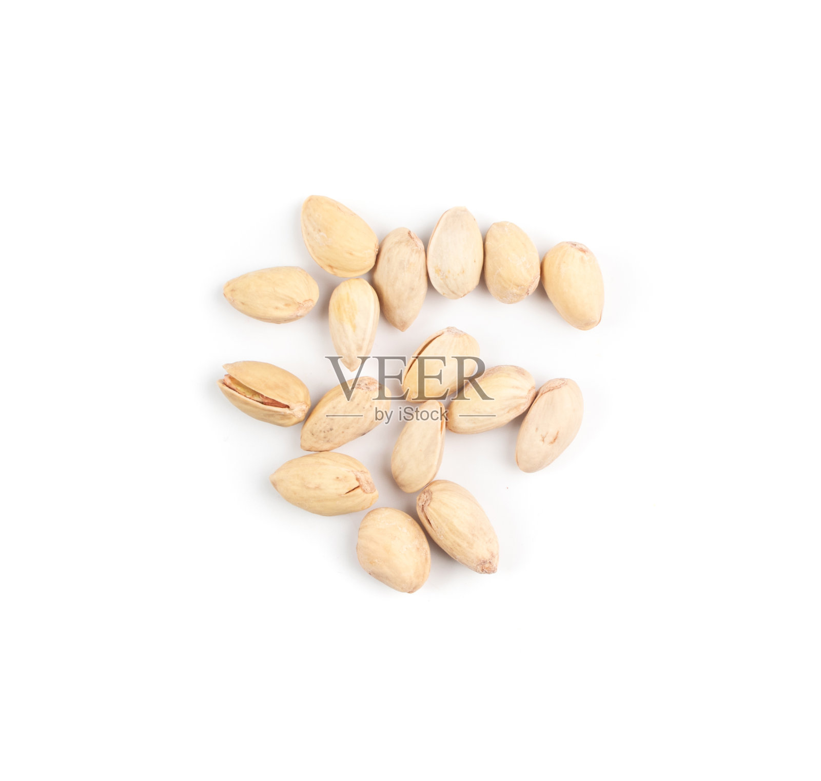 油炸开心果孤立，烤开心果堆照片摄影图片