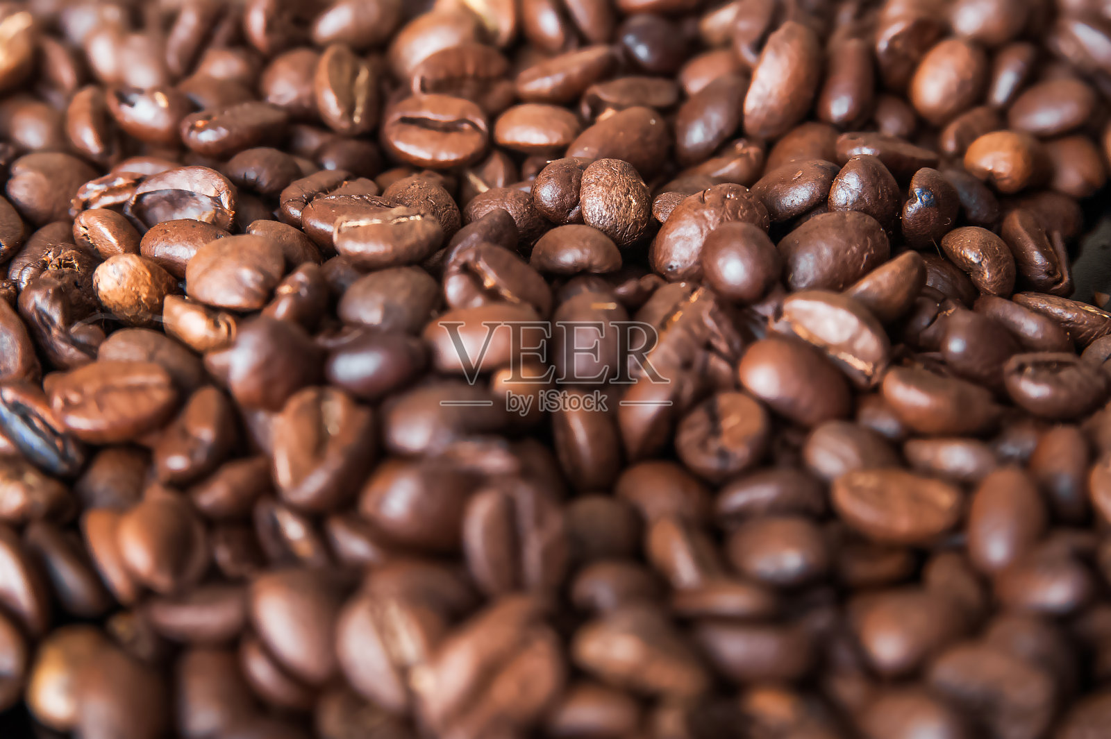 咖啡背景特写微距。大量的咖啡豆和拷贝空间。照片摄影图片