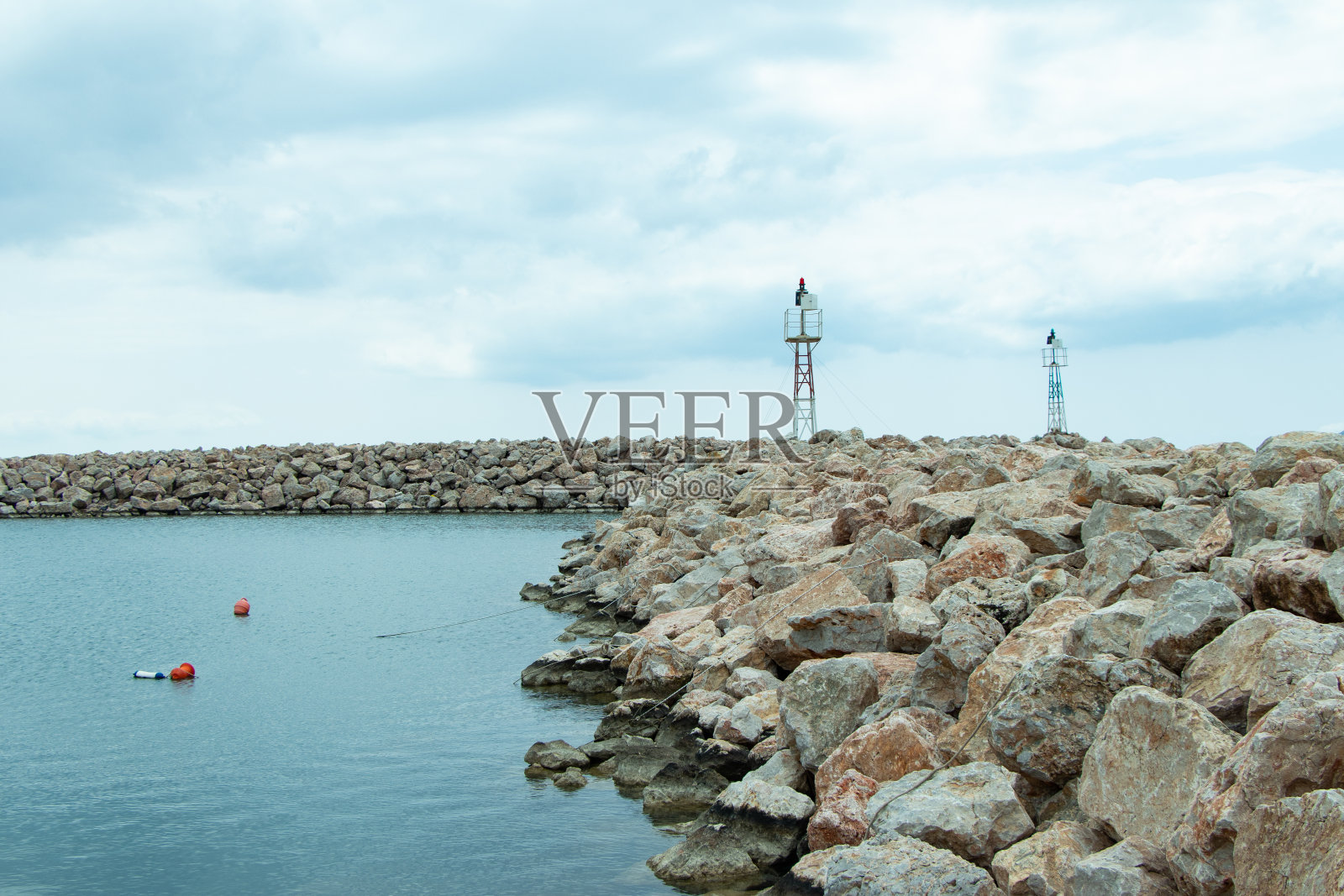 希奥斯岛科米村港口的灯塔照片摄影图片