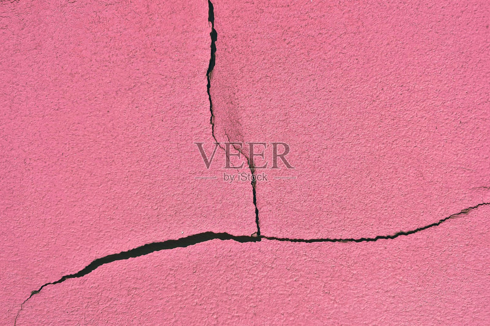 墙上的油漆裂了。抽象背景纹理照片摄影图片