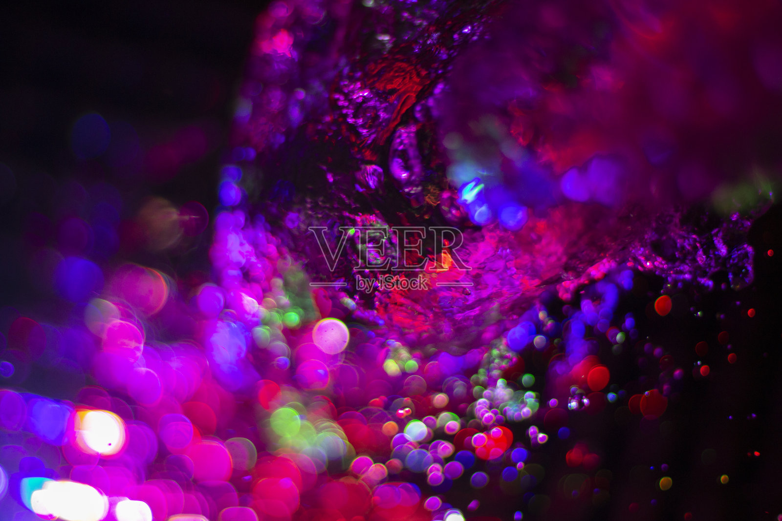 彩色纹理。水花洒出不同的颜色。照片摄影图片