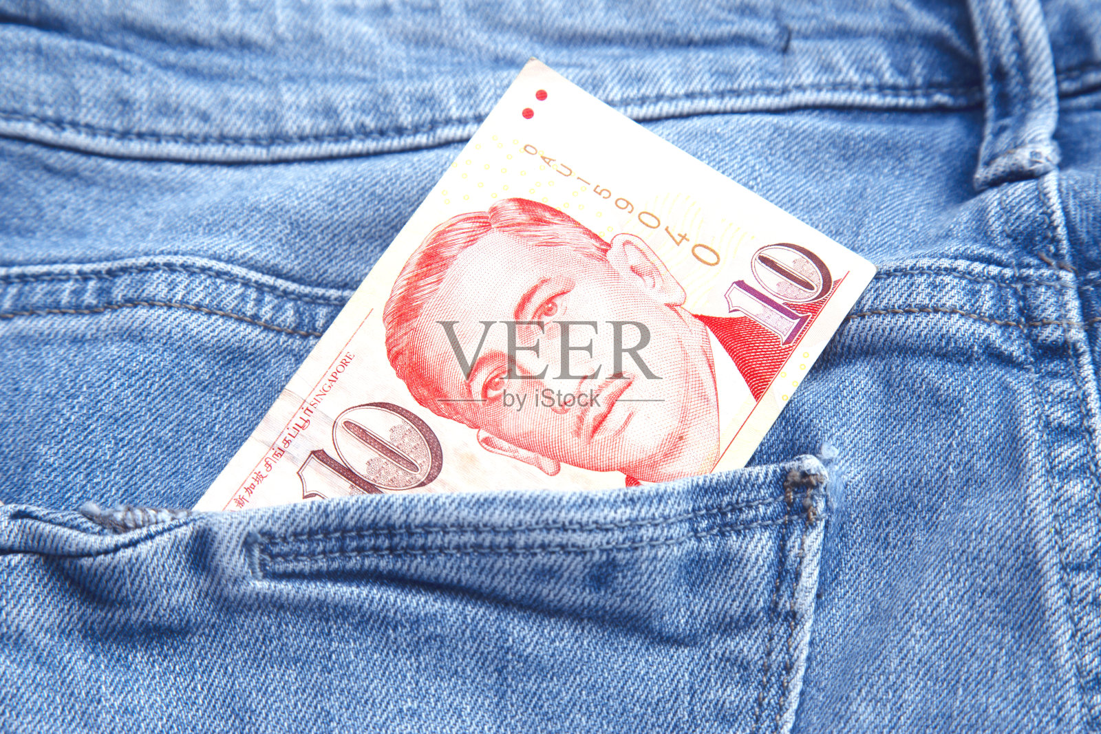 钱在口袋里照片摄影图片