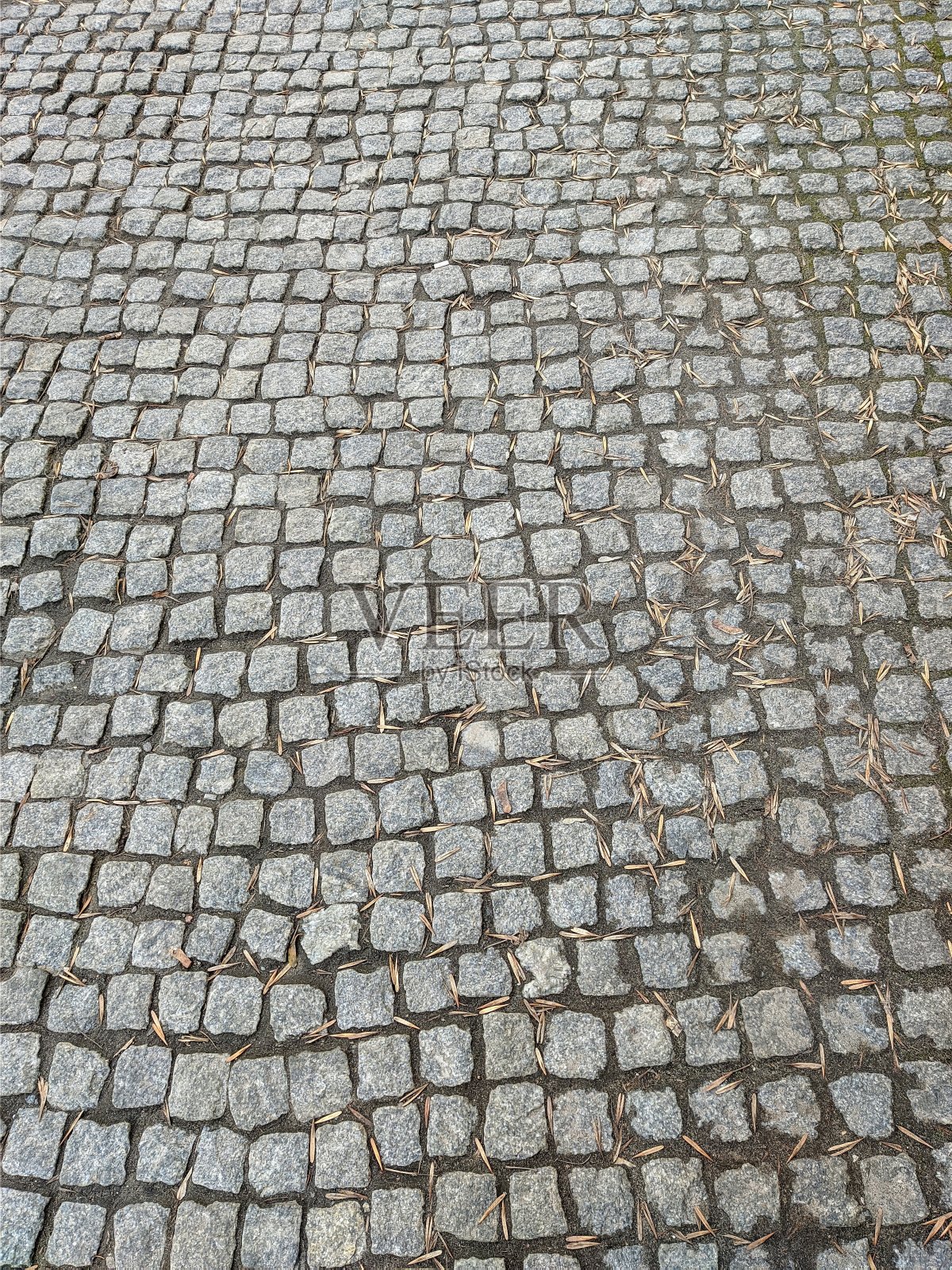 平铺的路面背景。圆铺平道路。照片摄影图片