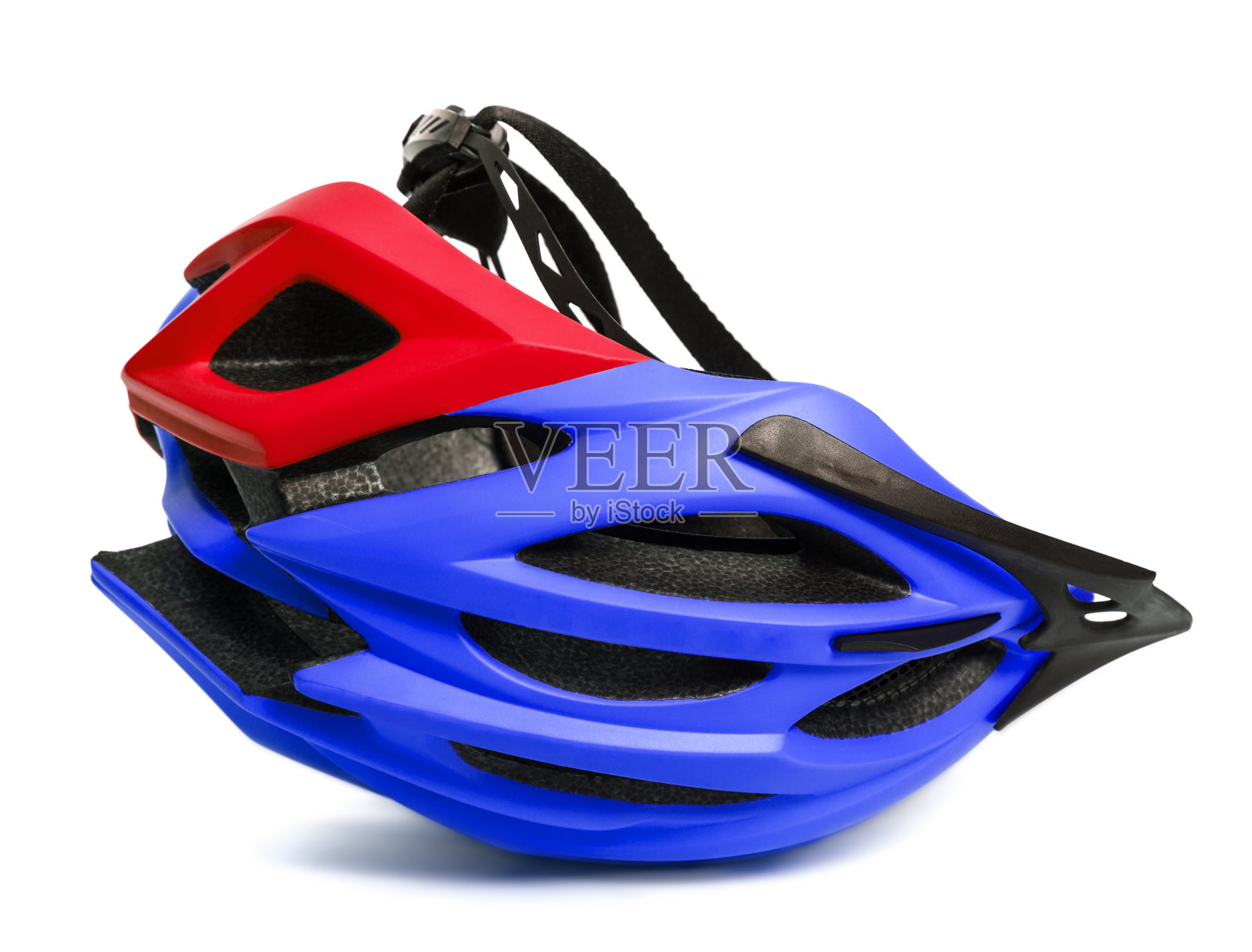 蓝色和红色的头盔倒挂在白色上照片摄影图片