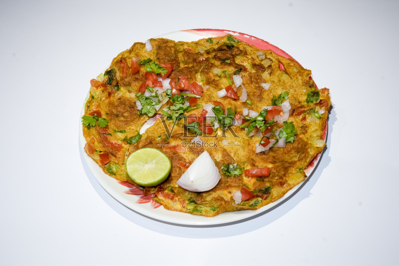 美味的煎蛋卷在盘子里照片摄影图片