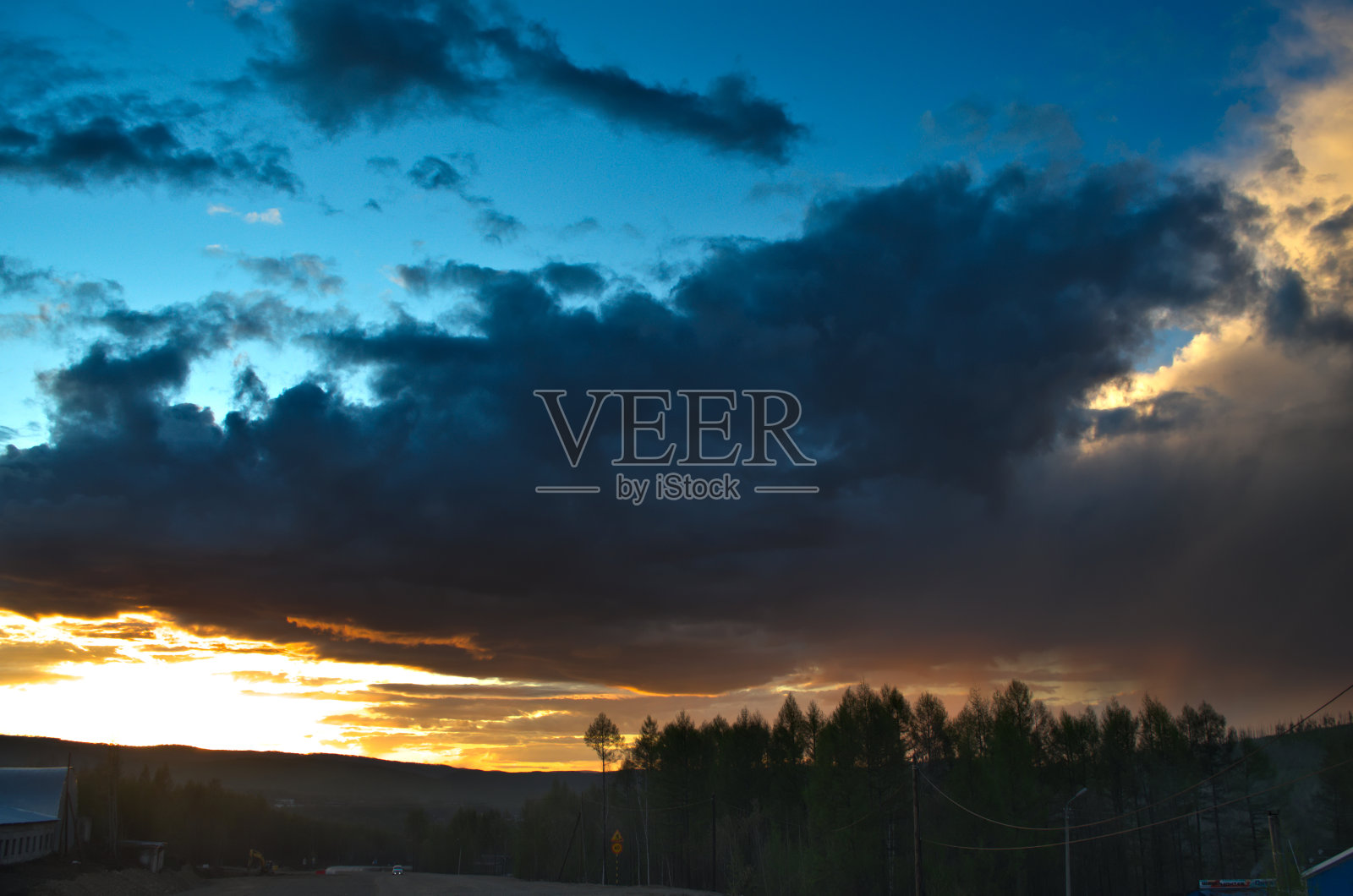 日落与雨照片摄影图片
