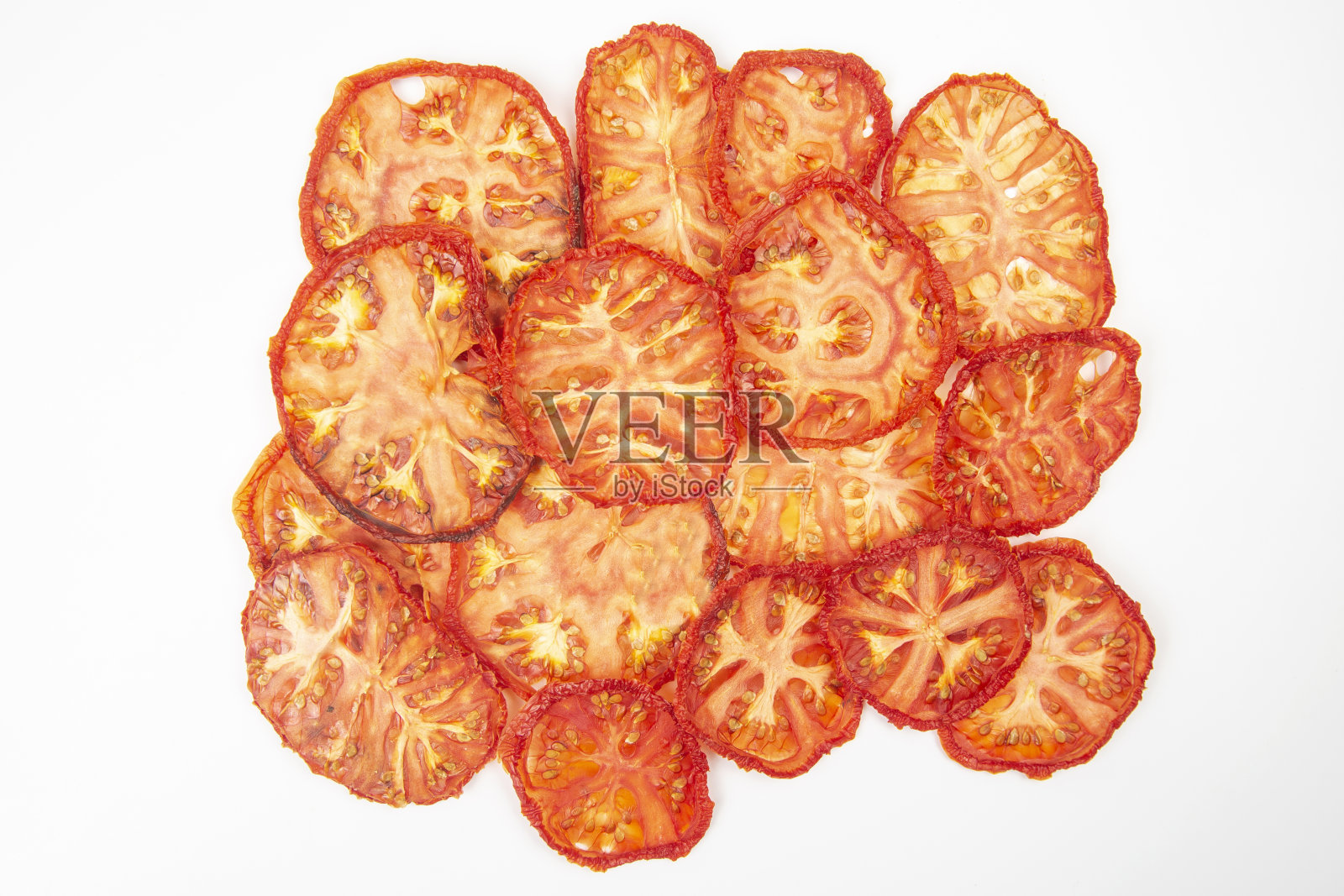 把干番茄片放在盘子里。维生素蔬菜食品照片摄影图片