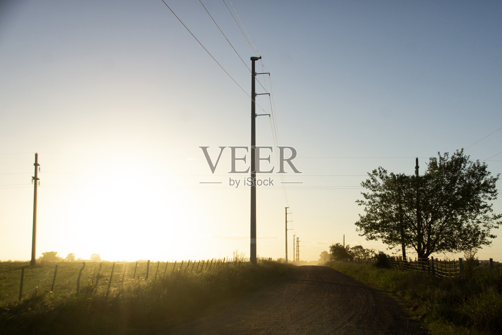 L日落与灯杆照片摄影图片