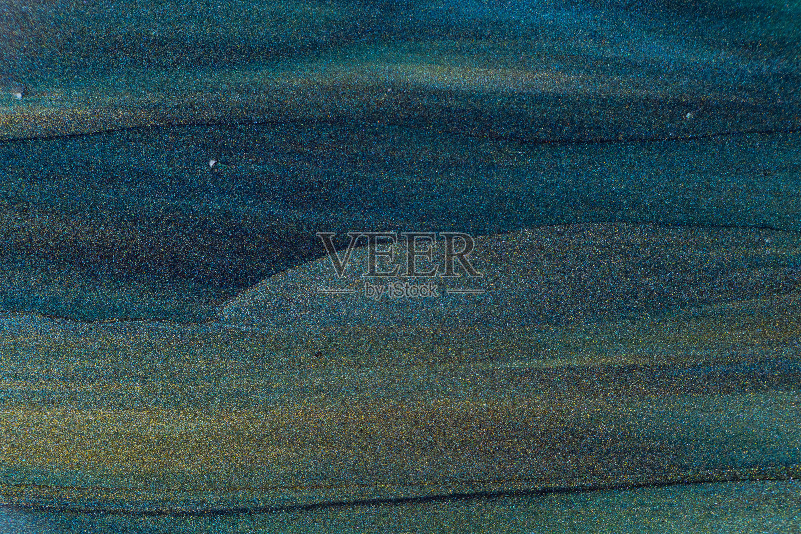 深蓝绿色闪光抽象背景。海蓝宝石背景与闪光蓝色闪光纹理。本空间照片摄影图片