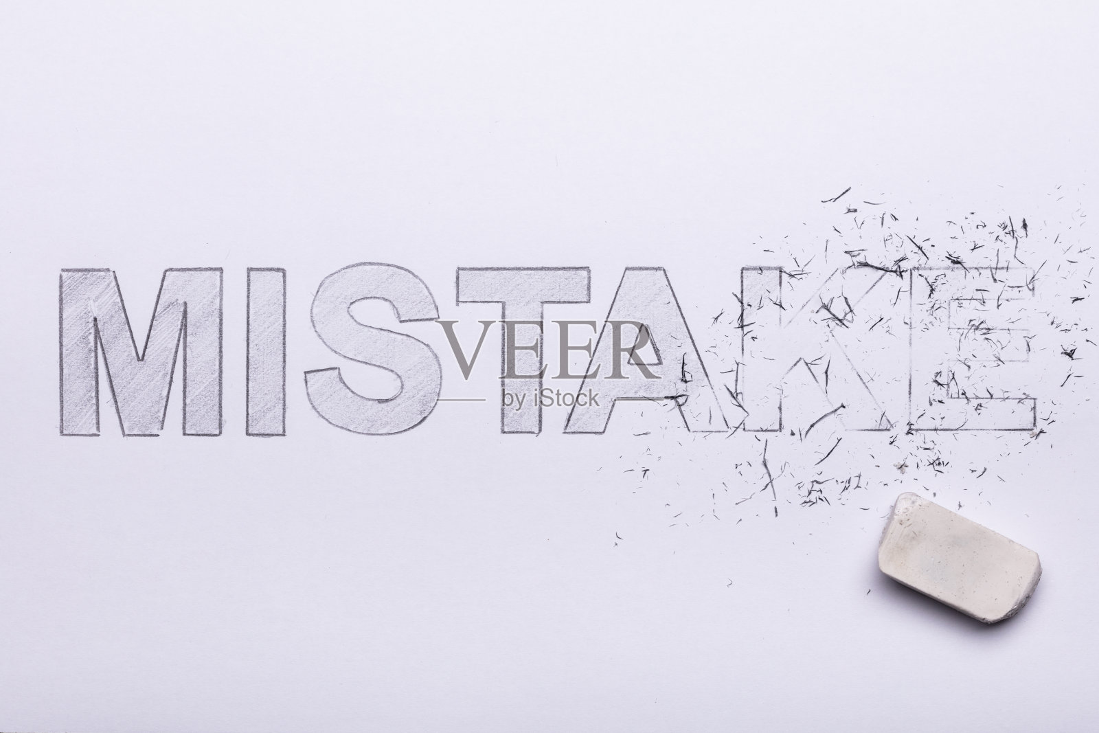 铅笔橡皮擦删除错误的单词照片摄影图片