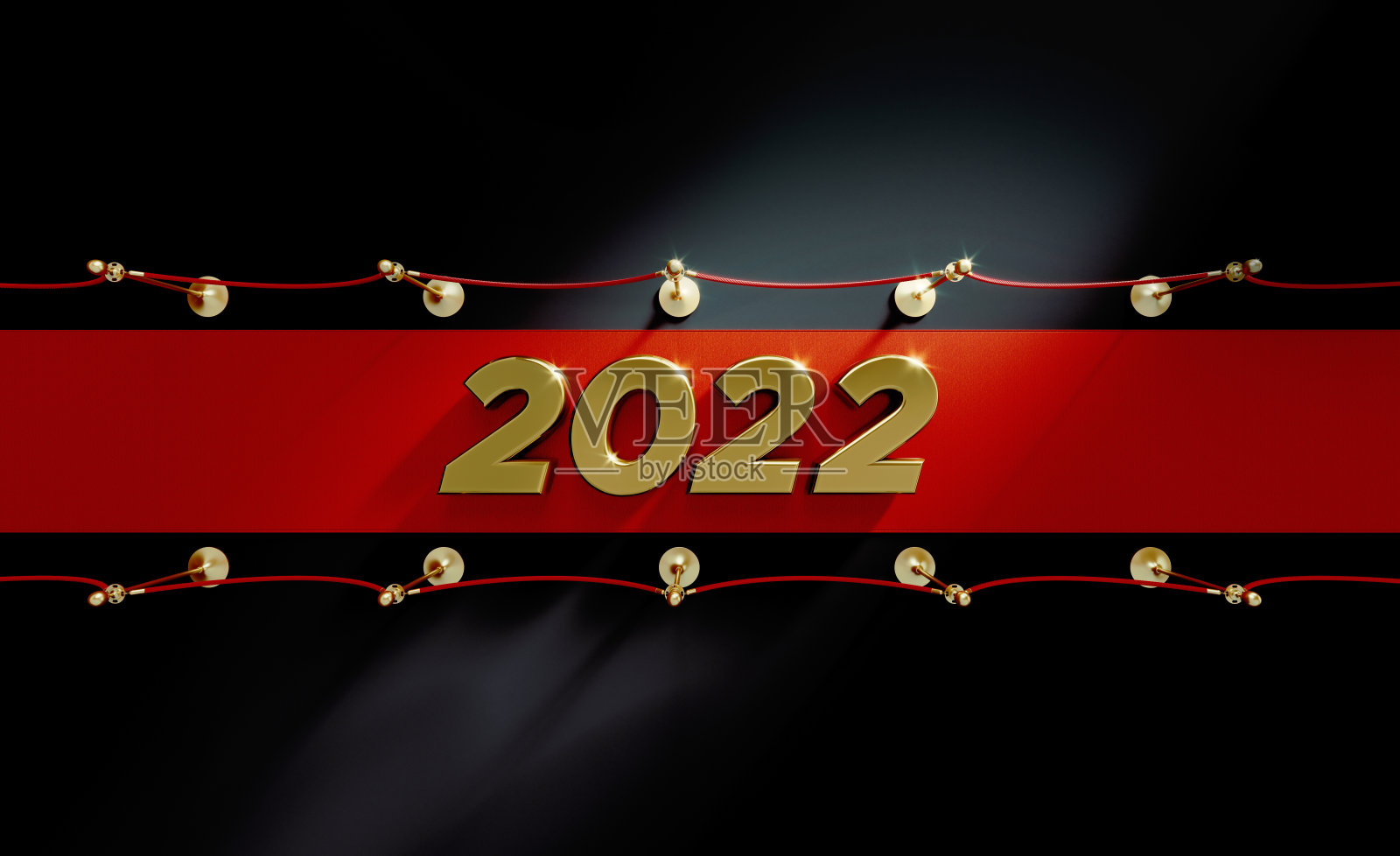 2022年红地毯概念- 2022年坐在红地毯上的黑色背景照片摄影图片