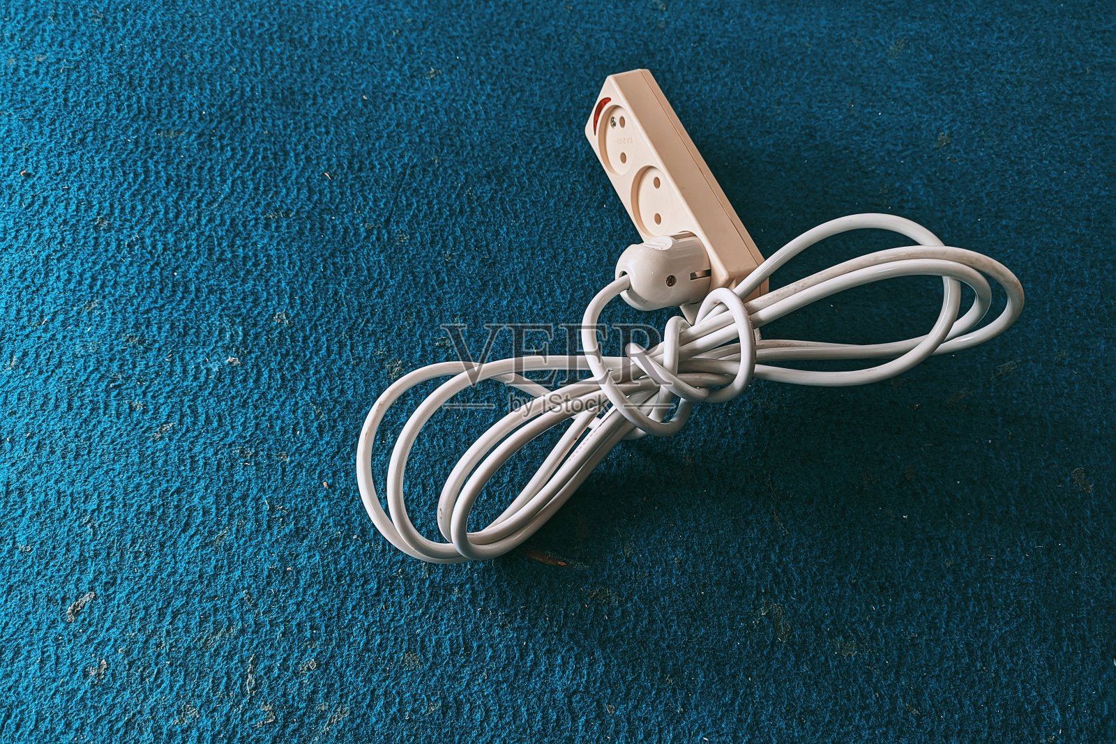 带插座的白色电源线卷轴照片摄影图片