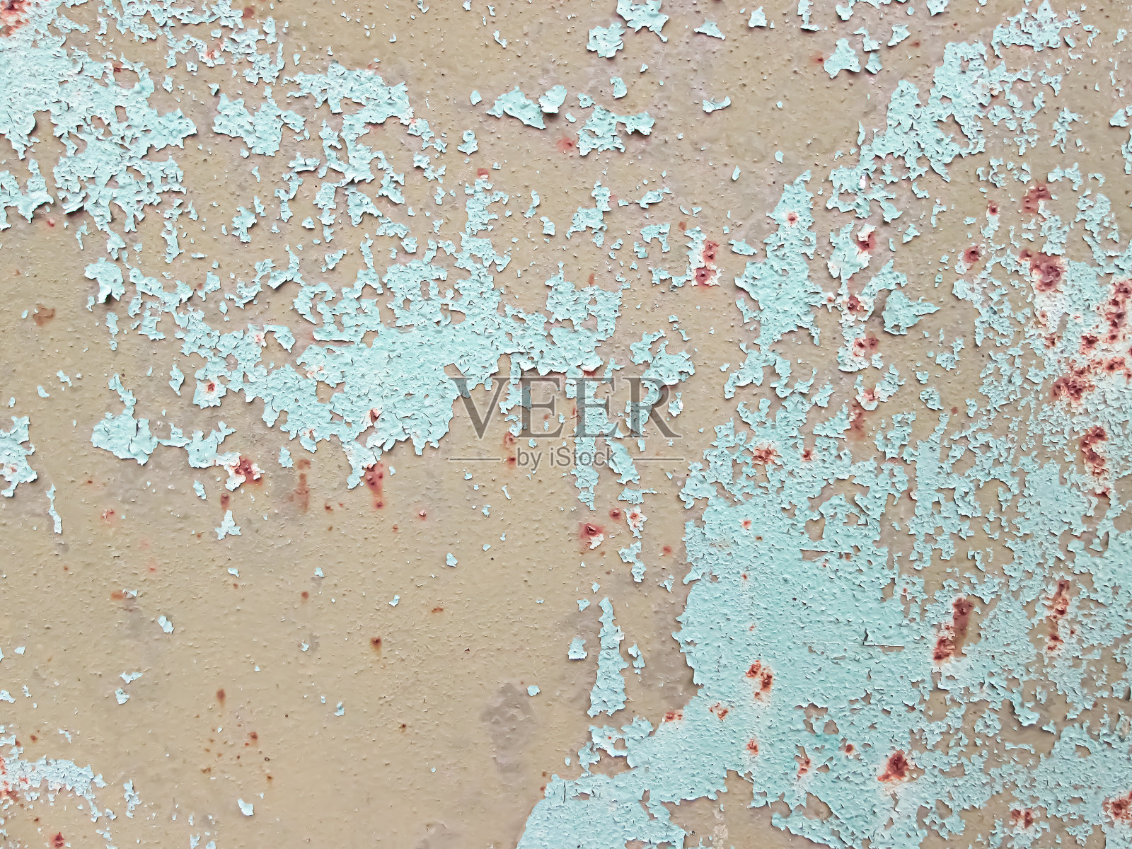 铁器表面的旧油漆。照片摄影图片