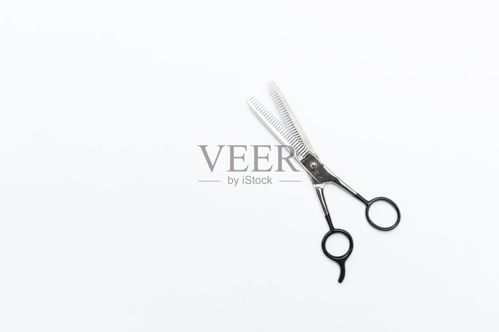 头发稀疏剪刀孤立在白色背景照片摄影图片