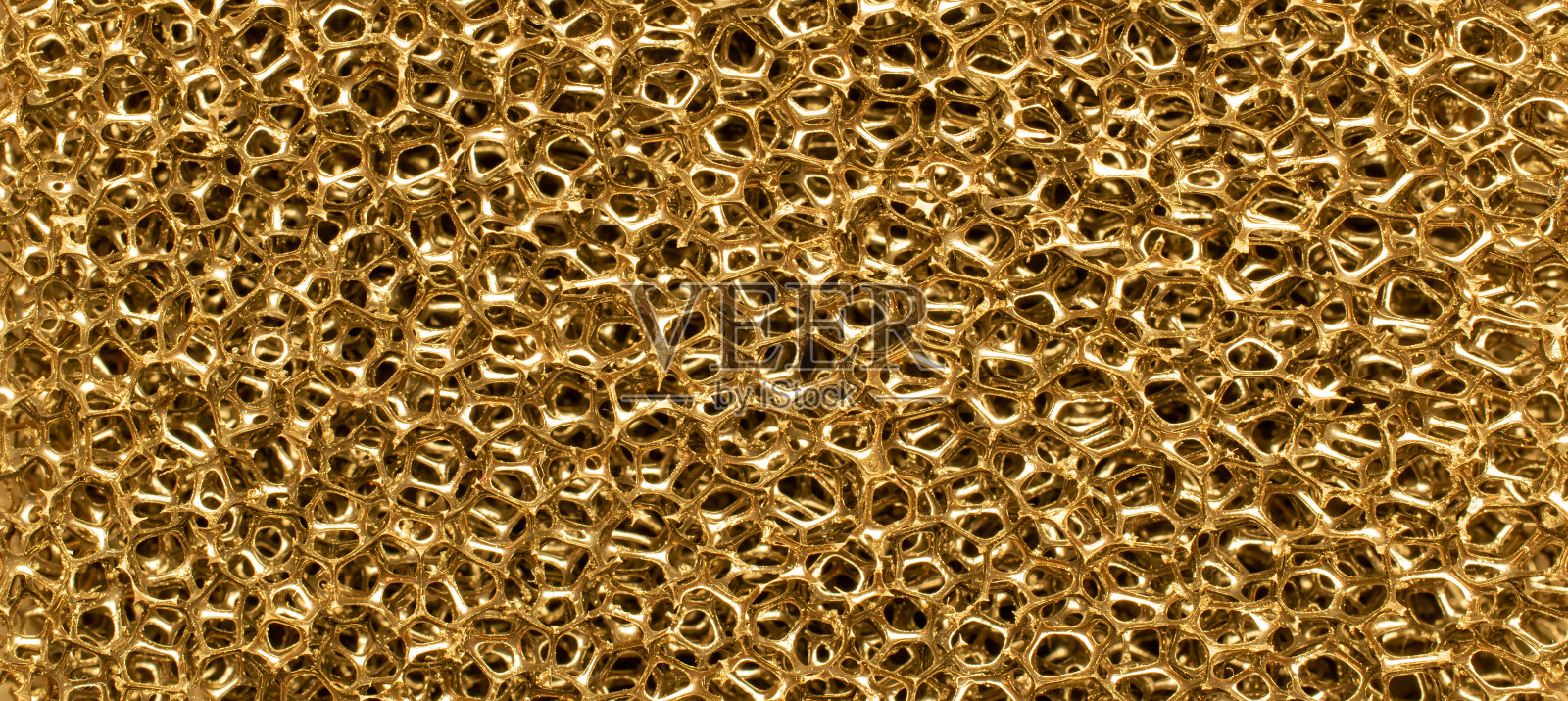黄金海绵。3D结构，背景，纹理。照片摄影图片
