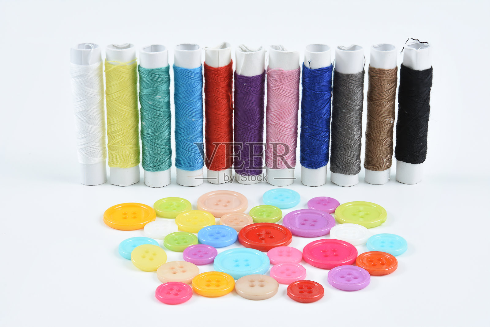 缝纫包放在白色的背景上。照片摄影图片