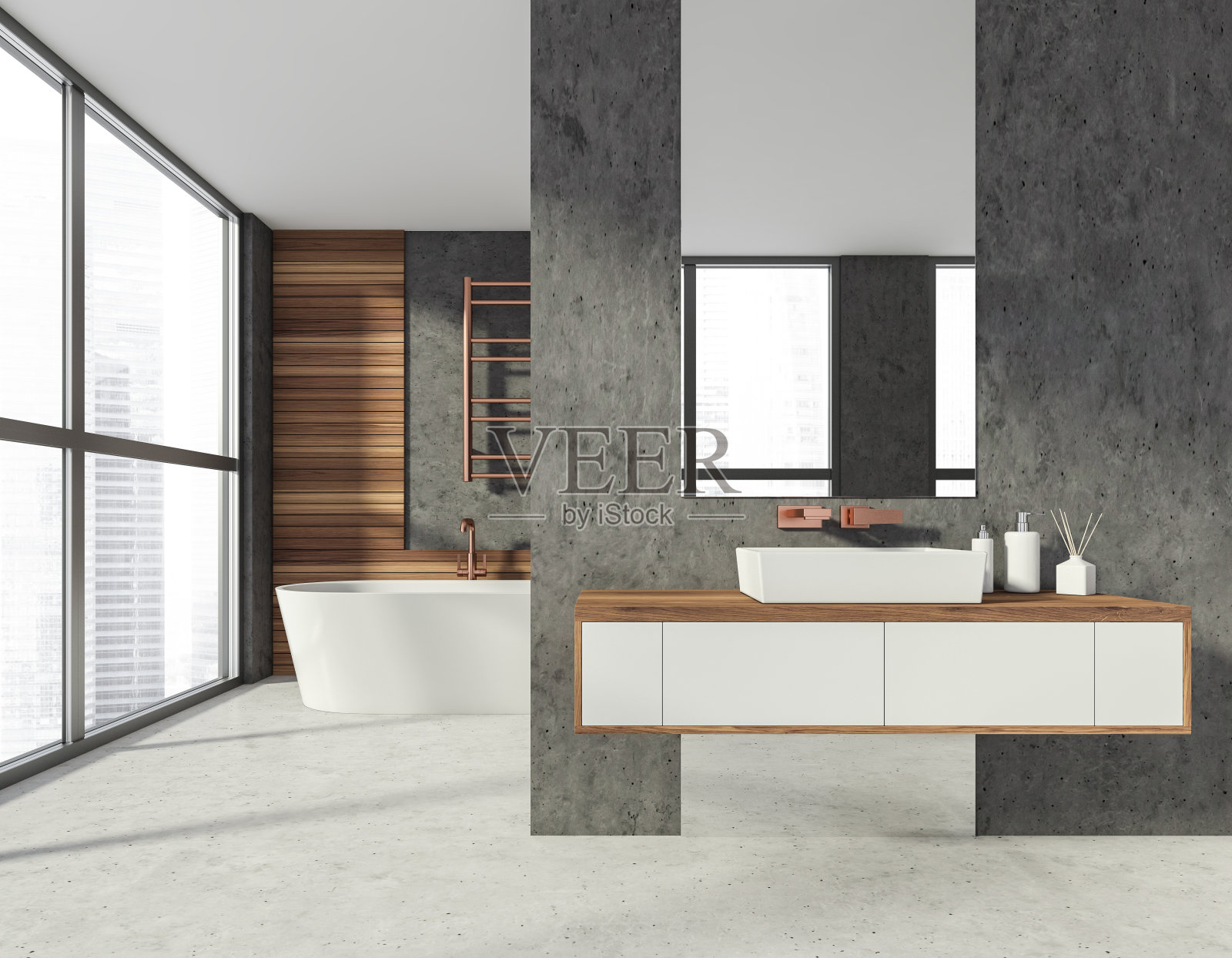 现代时尚的酒店浴室内部，陶瓷浴缸和水槽与镜子。混凝土楼板。木质装饰元素。全景窗口。城市的观点。照片摄影图片