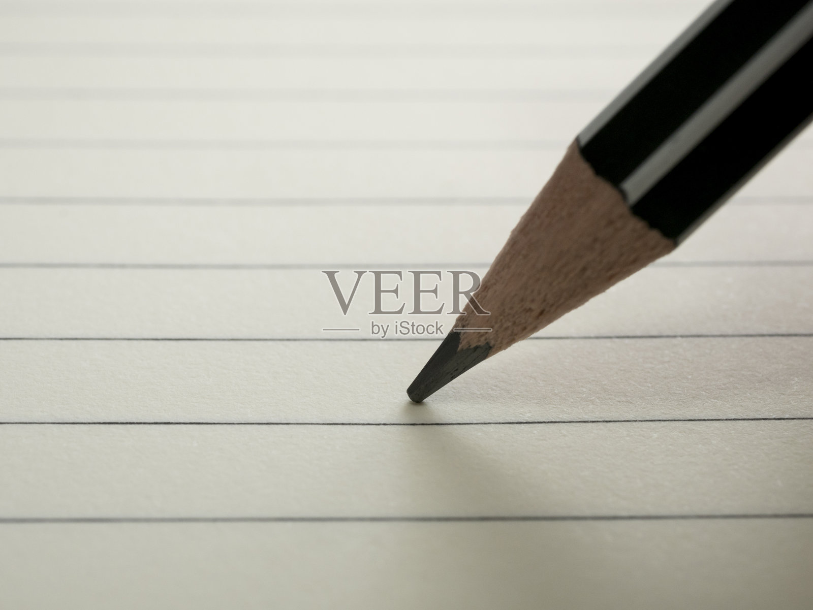 特写的铅笔写在纸上照片摄影图片