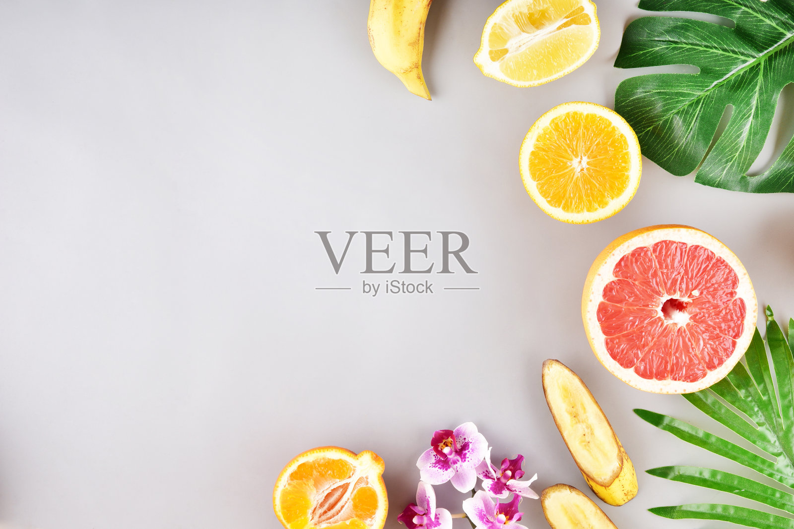 概念flatlay背景。热带水果。框架。照片摄影图片