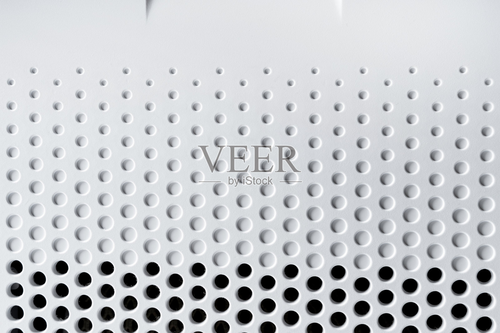 抽象背景高科技塑料表面有孔和圆照片摄影图片