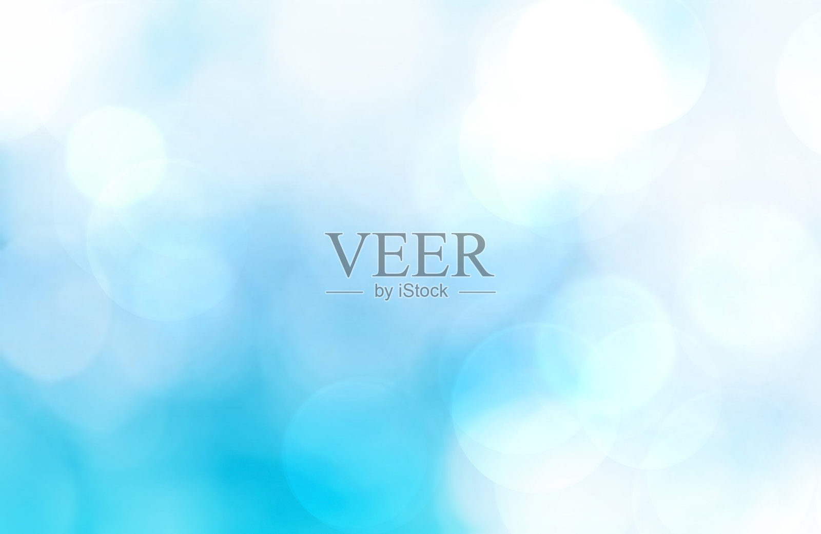 抽象的蓝色模糊背景与散景照片摄影图片