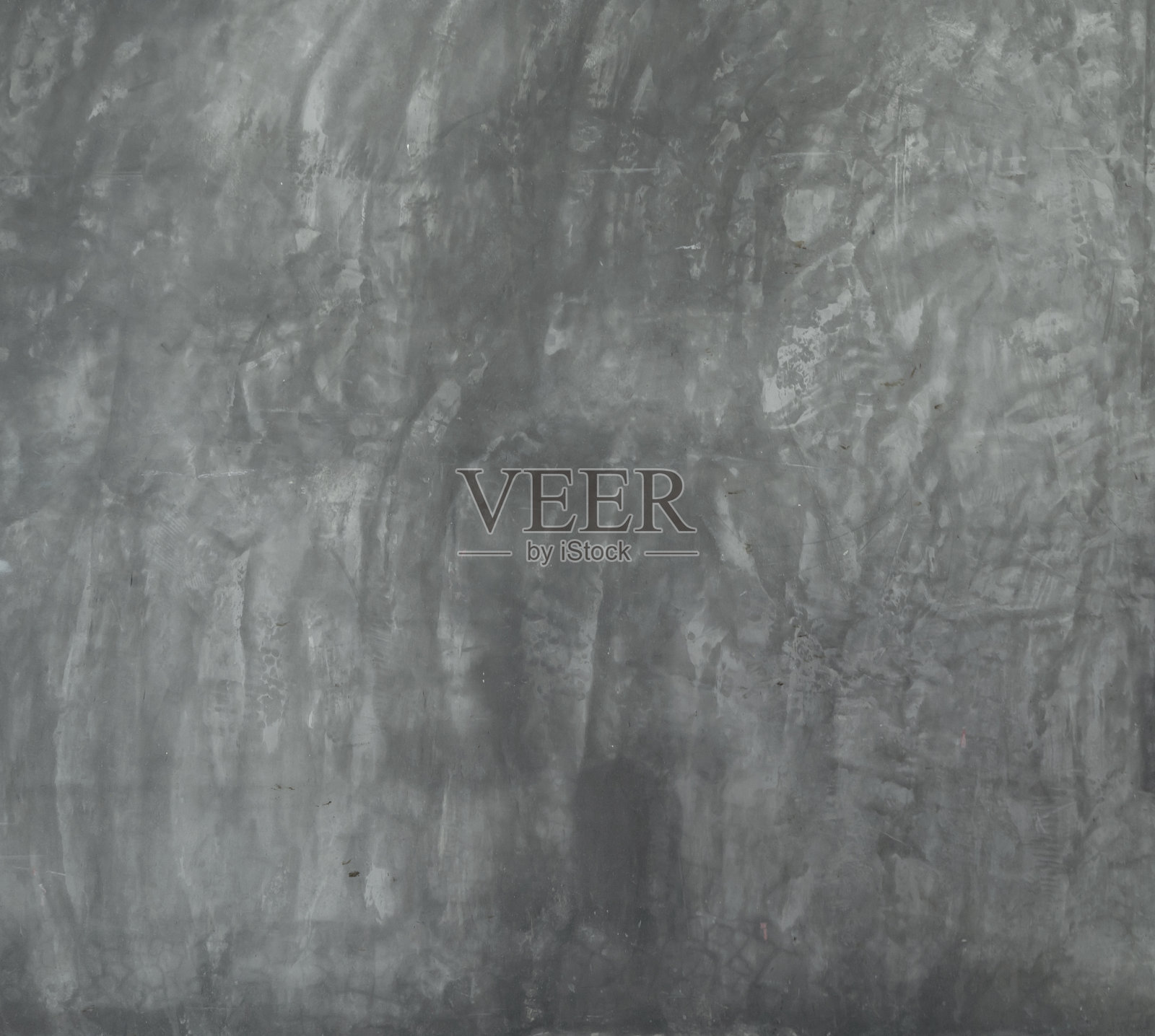 灰色粗糙的水泥墙面或地板花纹表面纹理。设计装饰背景的外部材料特写照片摄影图片