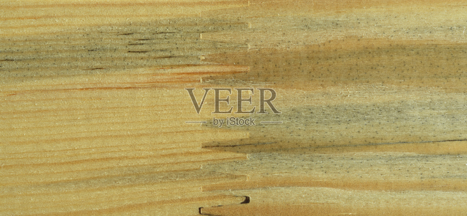 微距拍摄的接缝胶合锯木材。胶合板胶合硬木的一块木板胶合锯材纹理照片摄影图片