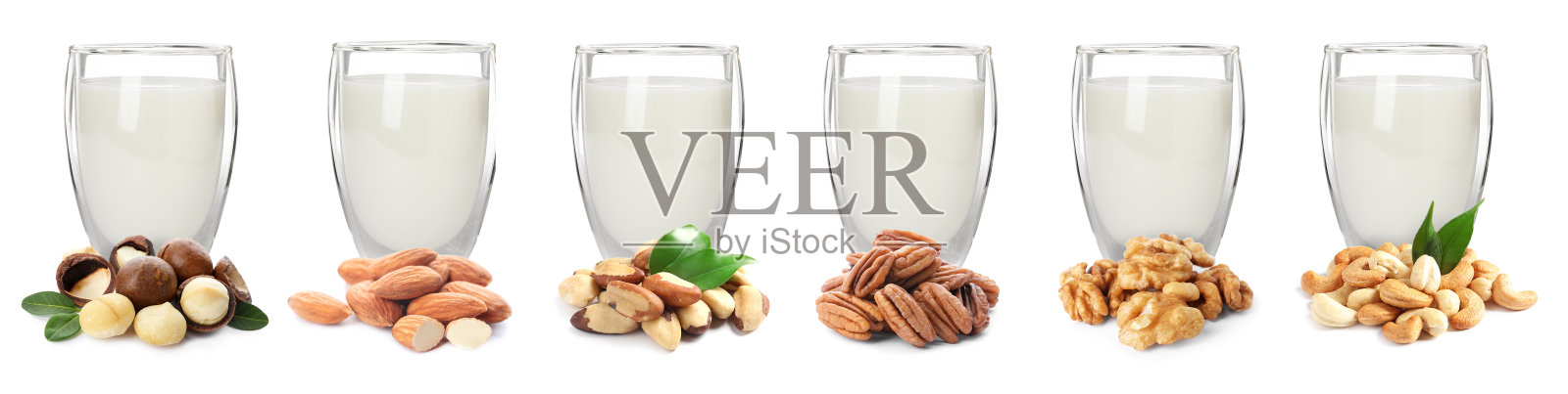 设置不同类型的素食牛奶和坚果在白色的背景。旗帜设计照片摄影图片