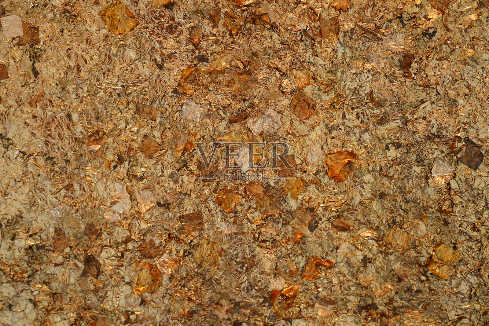 佛像佛像表面有许多金箔片作背景照片摄影图片