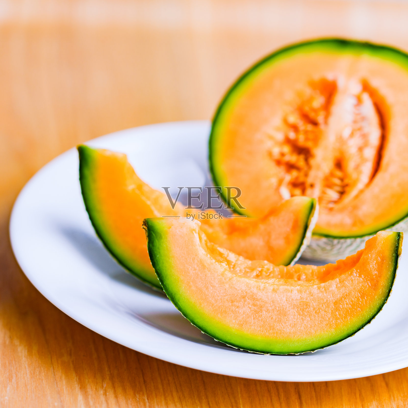 吃健康水果红瓜照片摄影图片