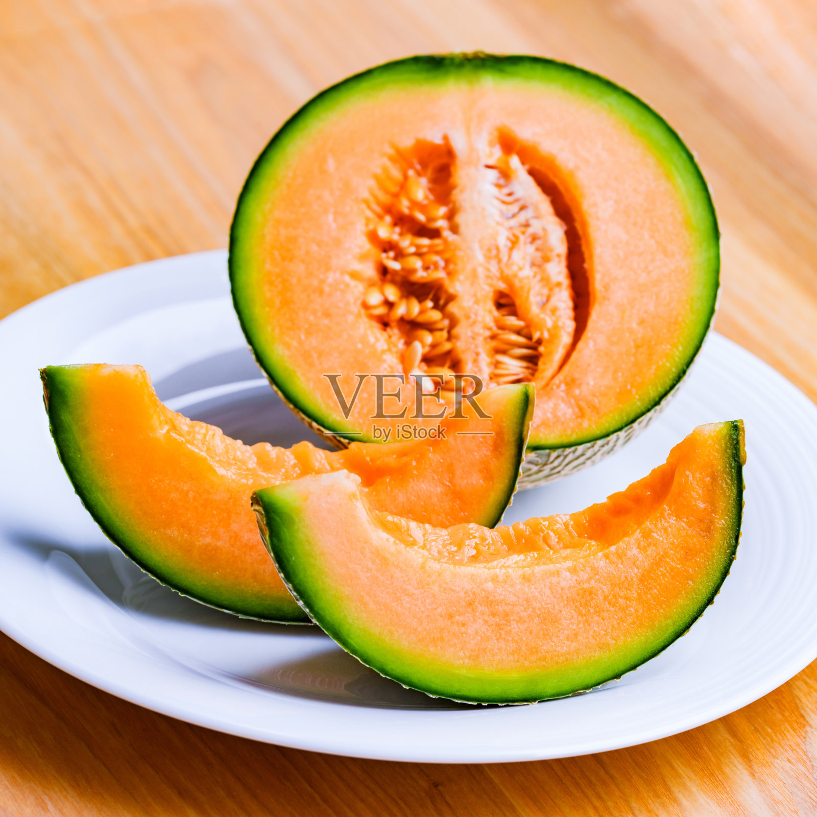 吃健康水果红瓜照片摄影图片