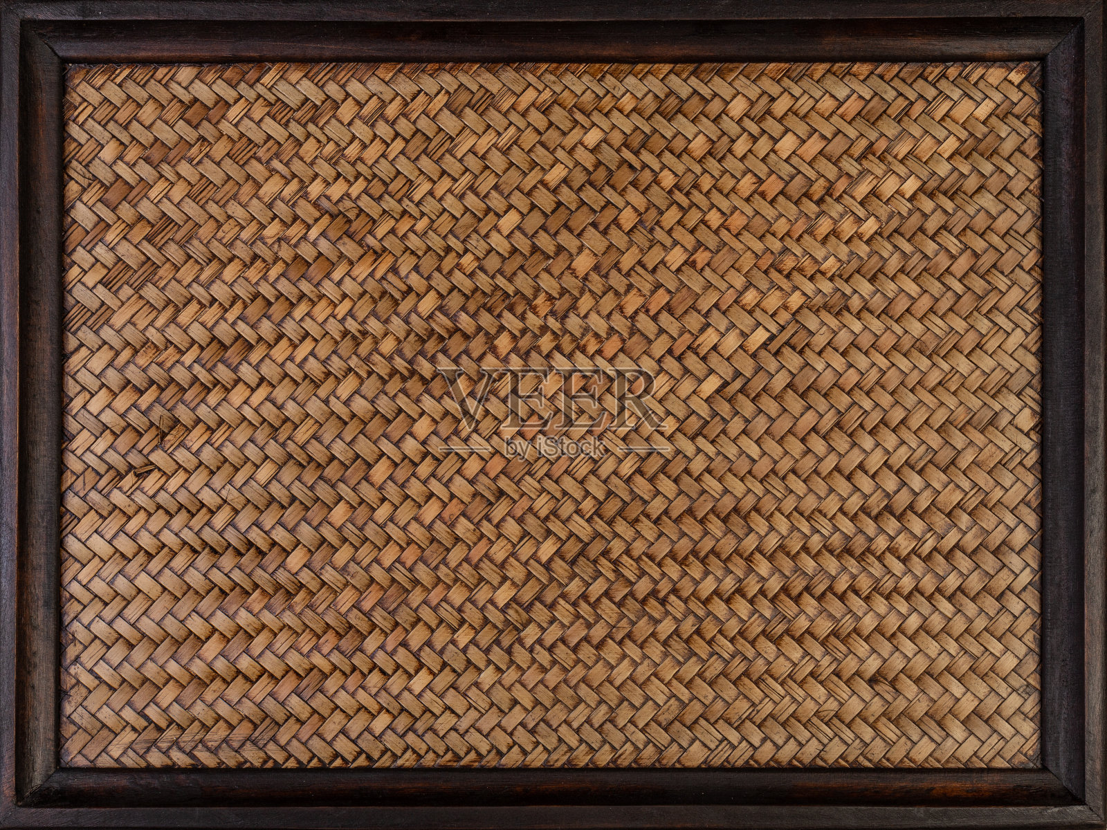 以木框为背景的竹制饰面。照片摄影图片
