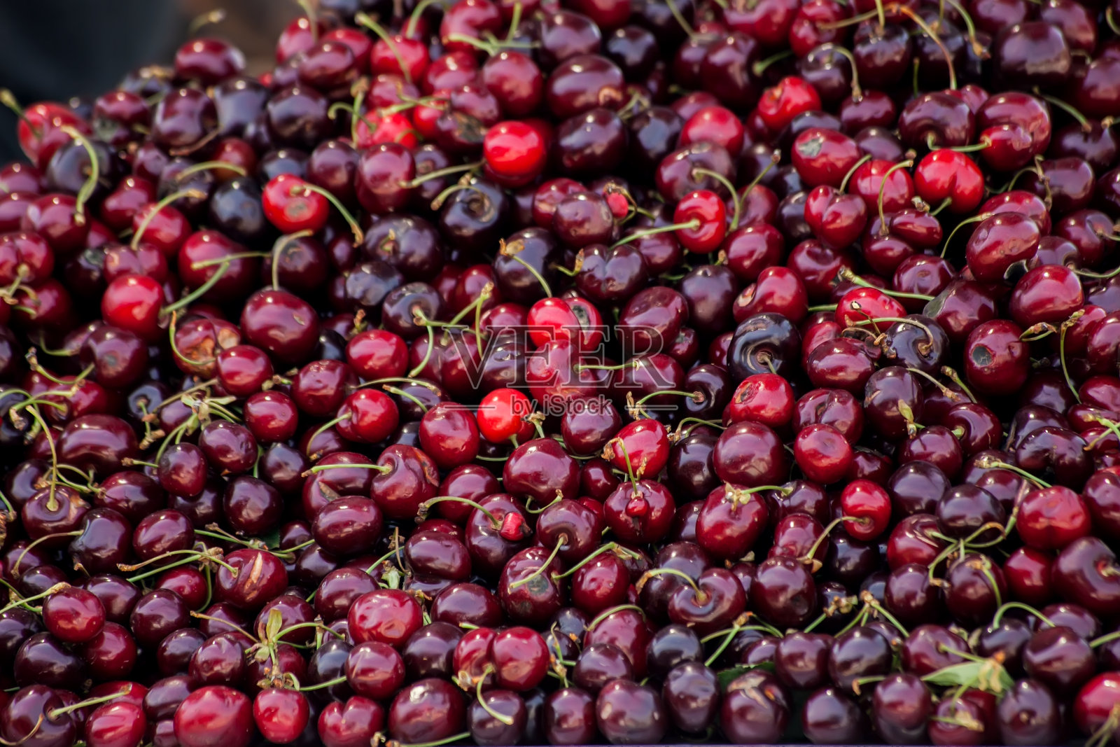 樱桃的背景。新鲜有机食品照片摄影图片