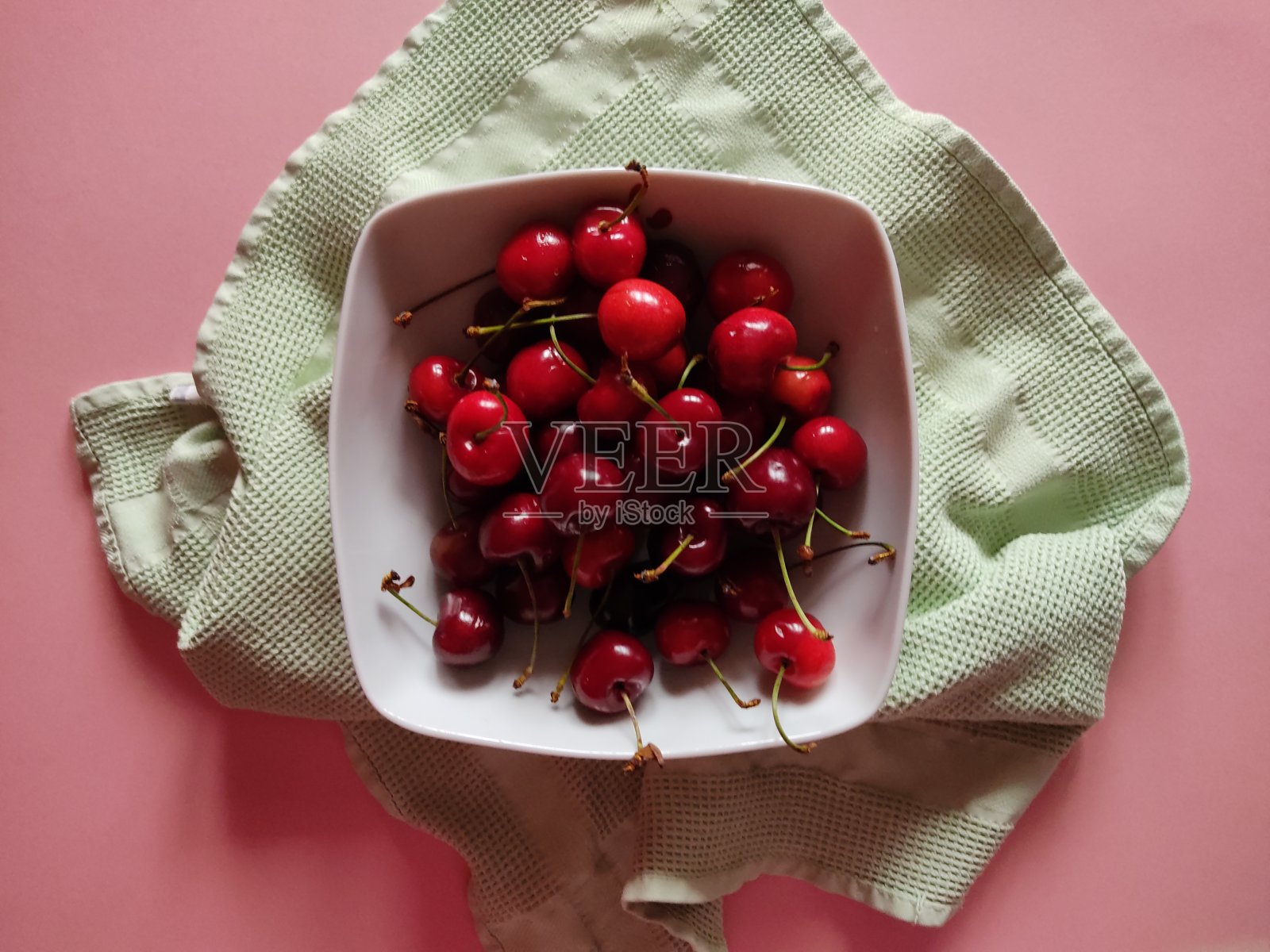 樱桃碗。照片摄影图片