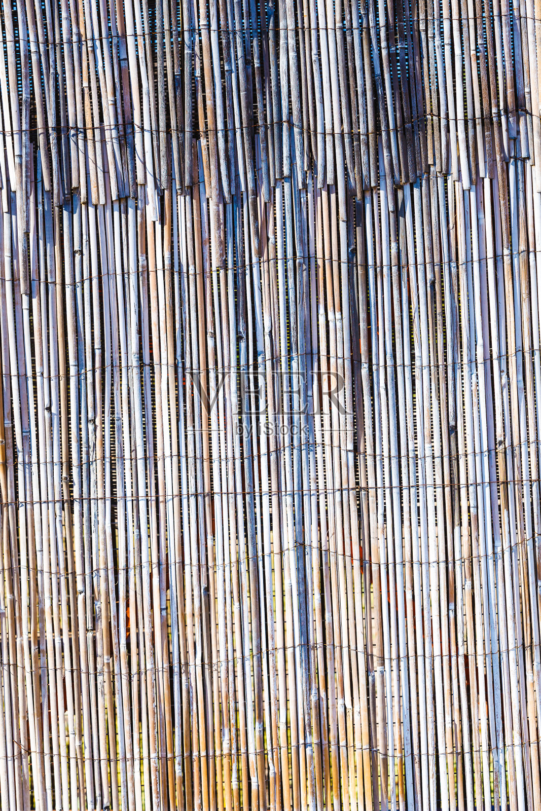 褐色的竹栅栏靠近照片摄影图片