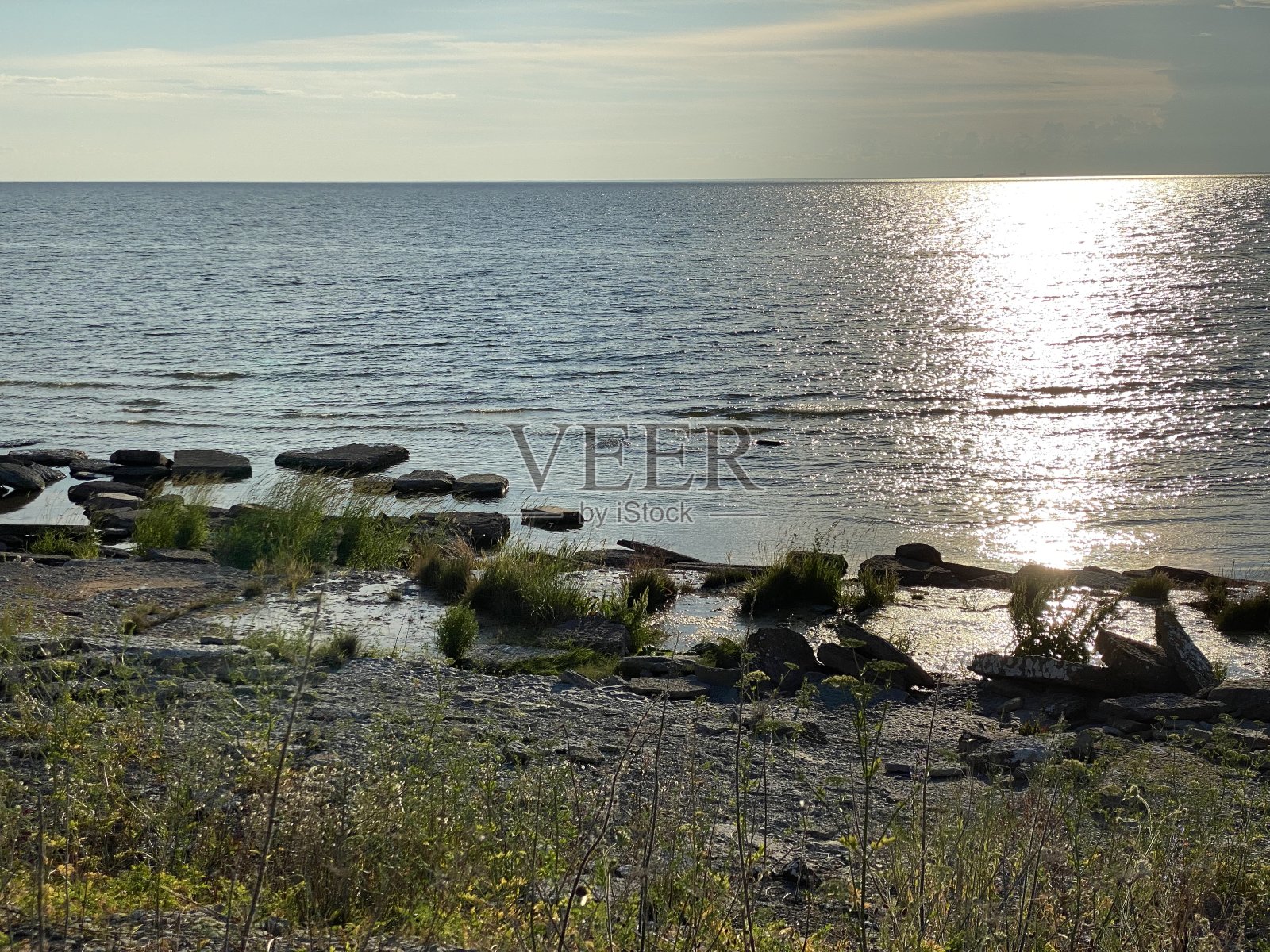 太阳在海里照片摄影图片