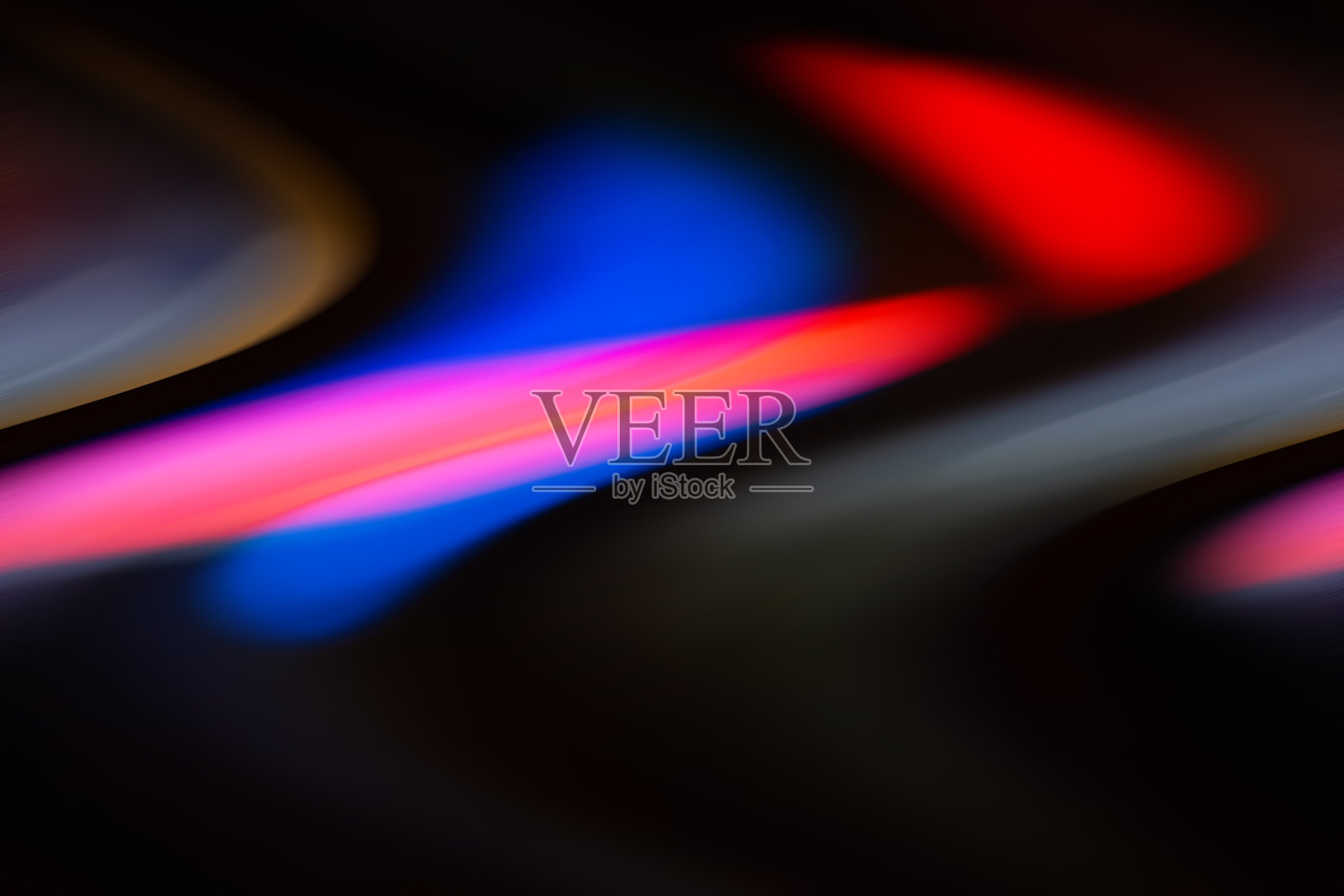 抽象模糊了黑、红、蓝、灰等色点。照片摄影图片