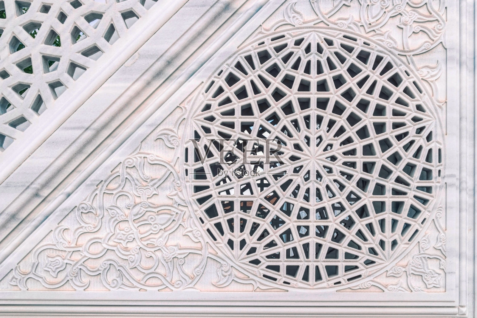 东方风格的雕刻花卉图案的石材大理石墙照片摄影图片