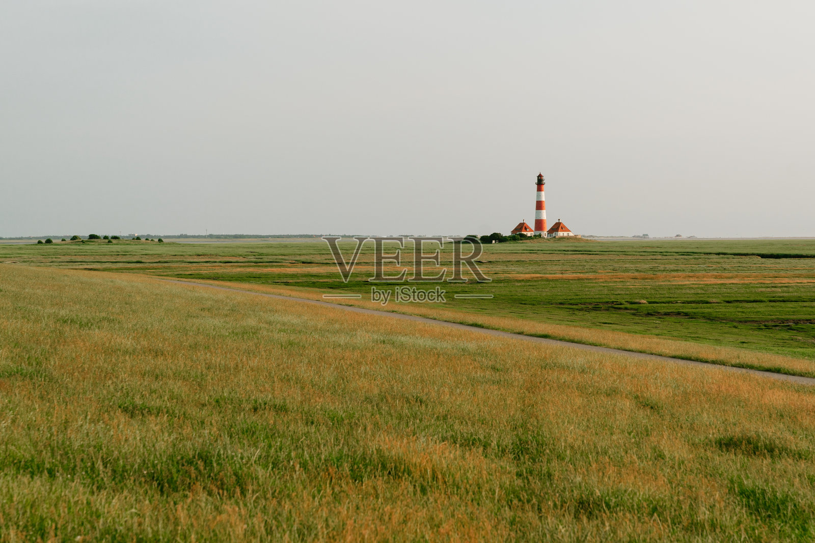 灯塔Westerheversand, Westerhever，广阔的北欧景观在北海照片摄影图片
