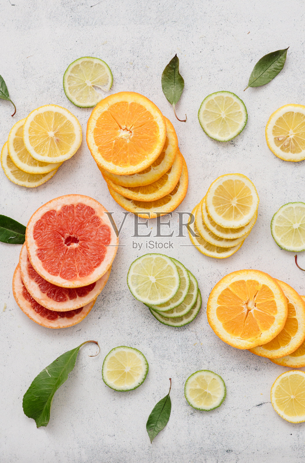 白色背景的柑橘类水果。照片摄影图片