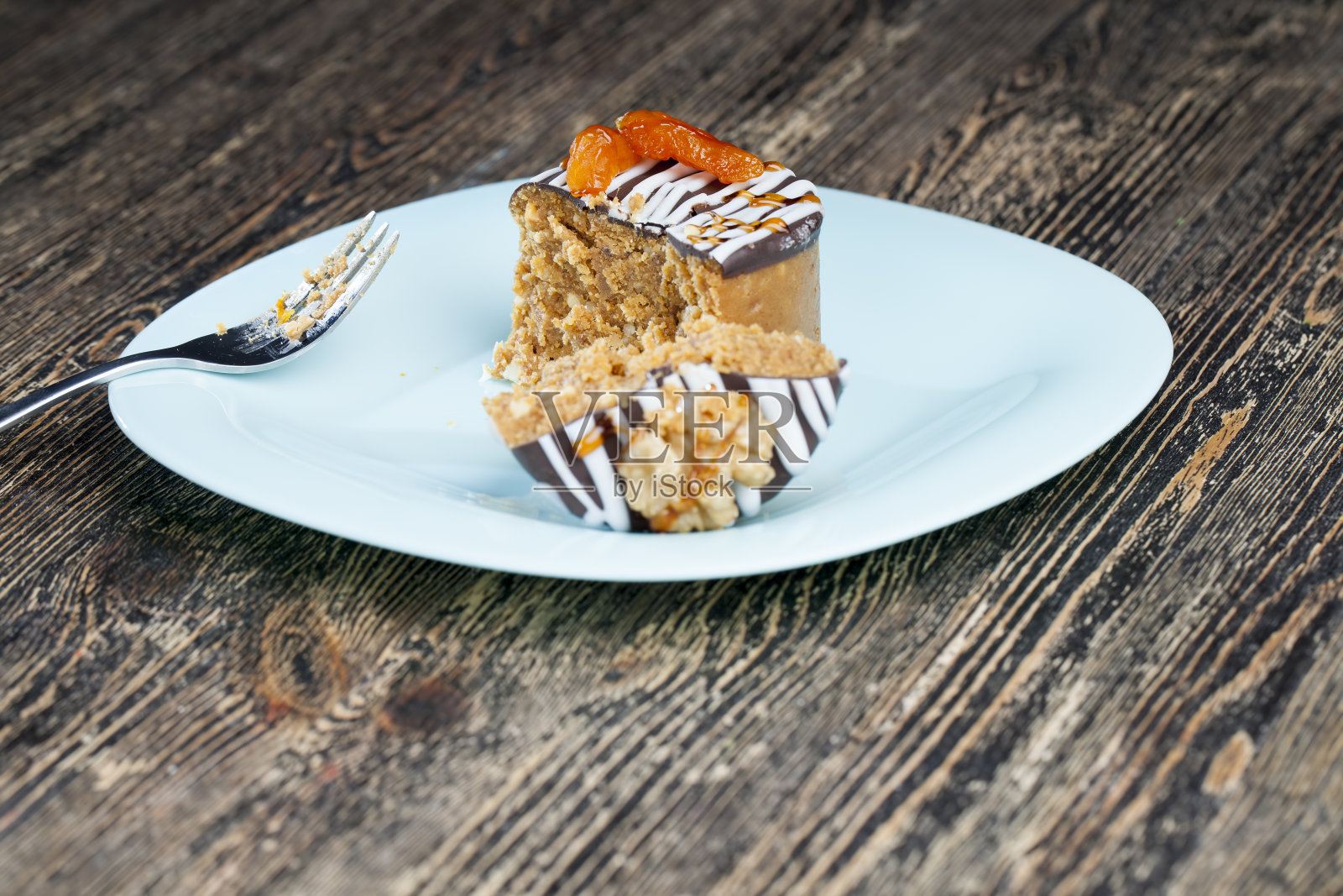 用花生、糖做成的甜蛋糕照片摄影图片