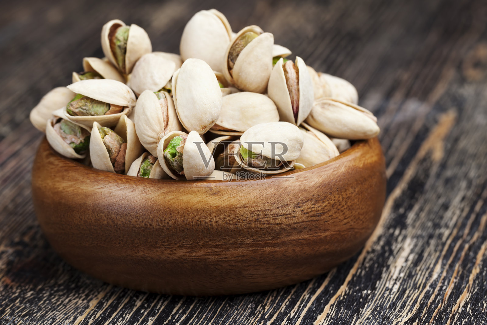 美味又咸的开心果照片摄影图片