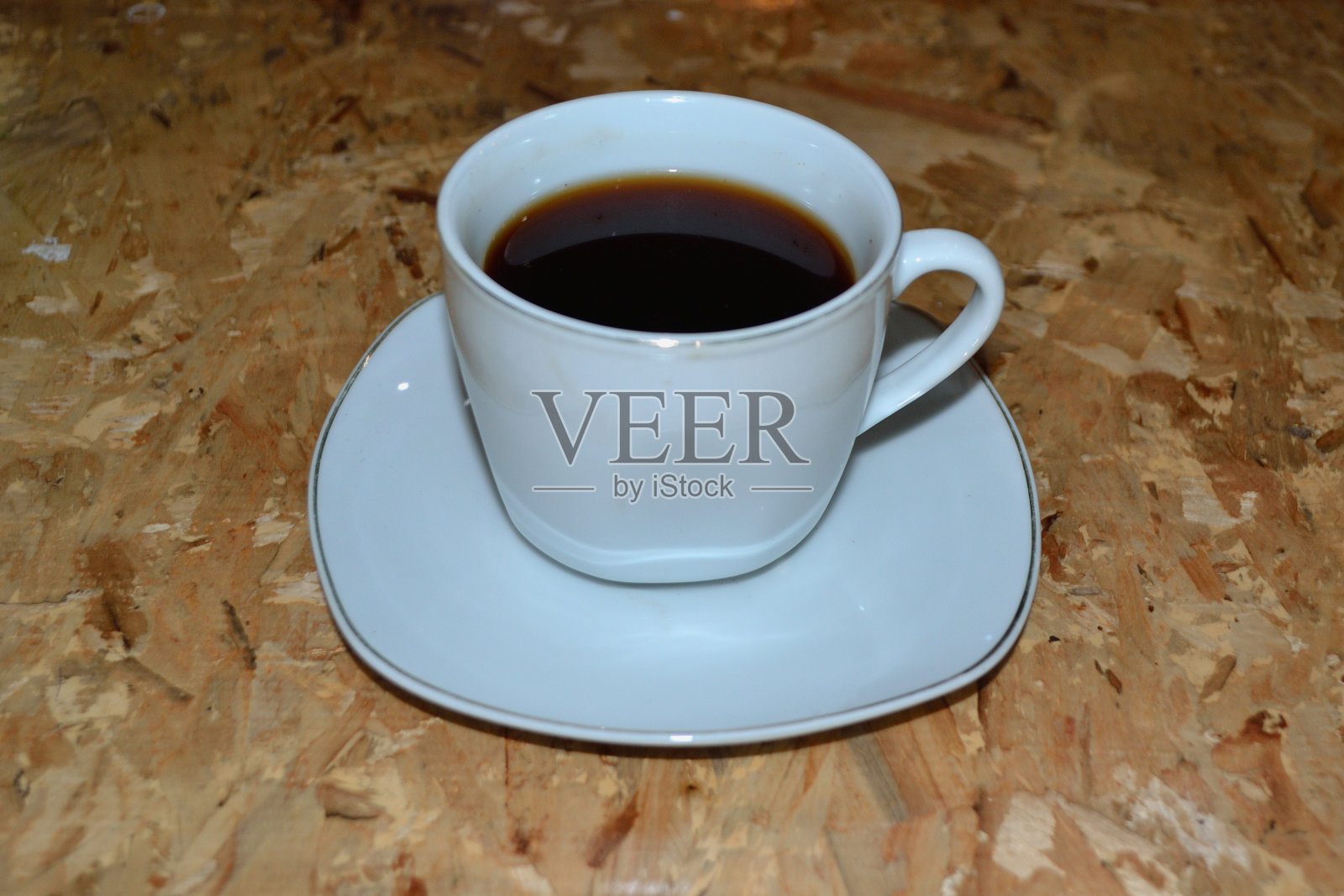 白杯子里的黑咖啡照片摄影图片