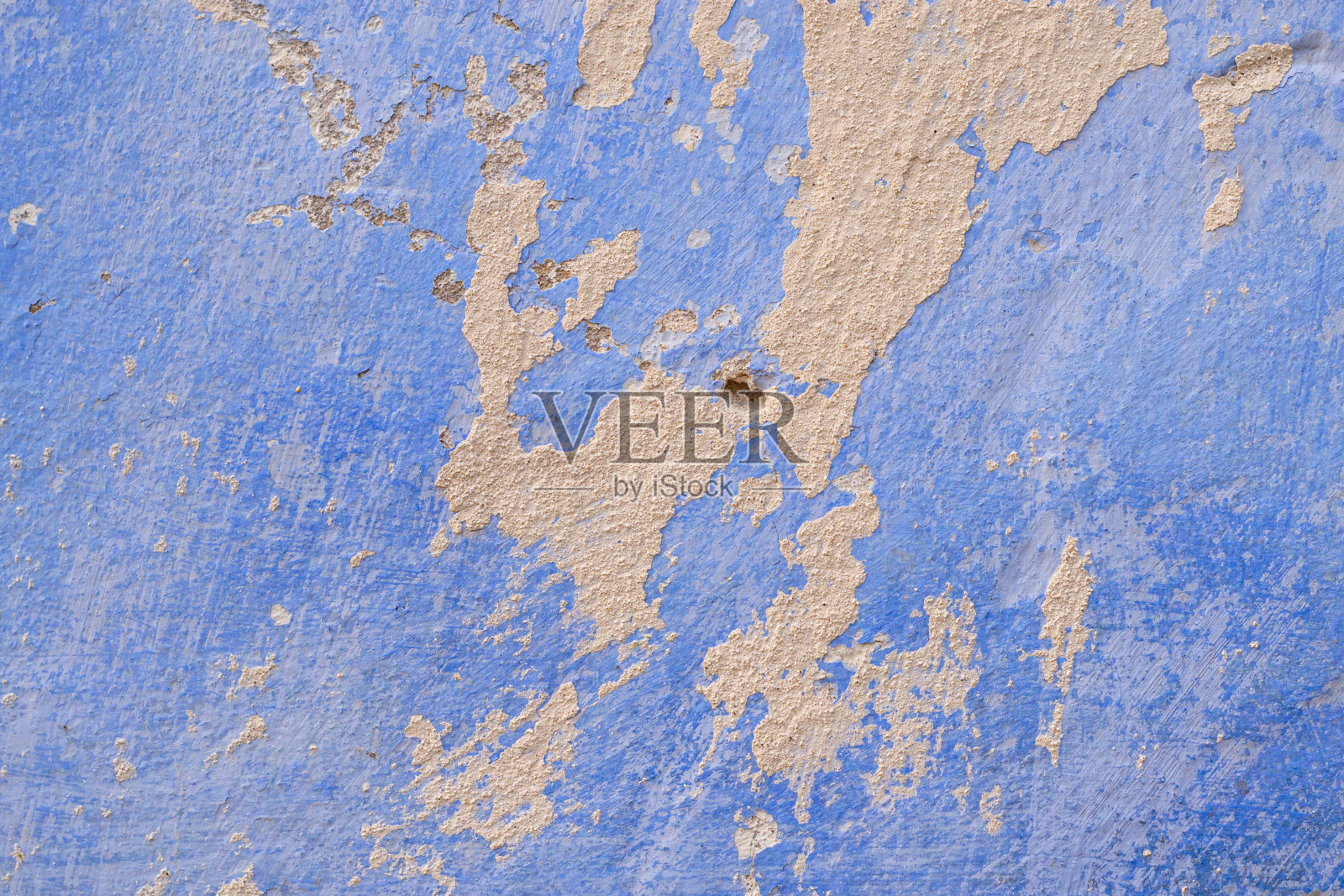 旧灰泥墙的纹理，用蓝色粉刷。特写,墙纸,背景。照片摄影图片