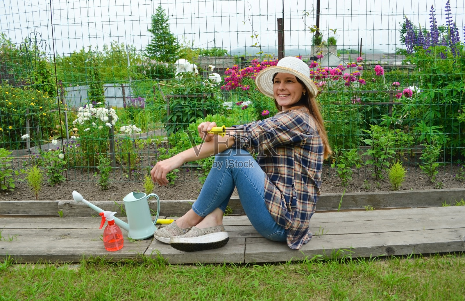 园丁夏日赏花照片摄影图片