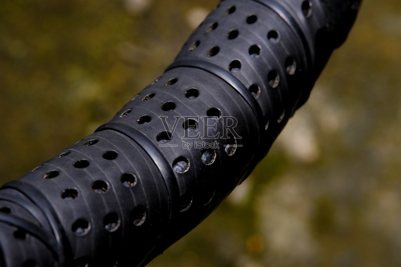 抽象的微距摄影。近皮革纹理汽车方向盘照片摄影图片