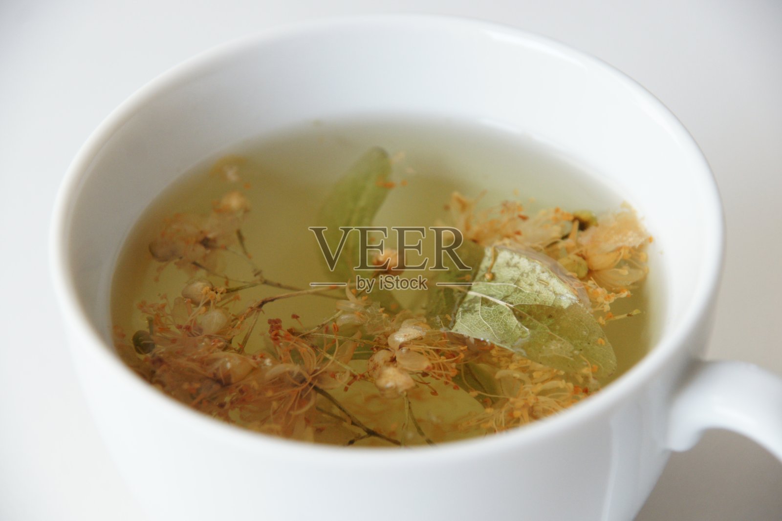 由干菩提花制成的茶照片摄影图片