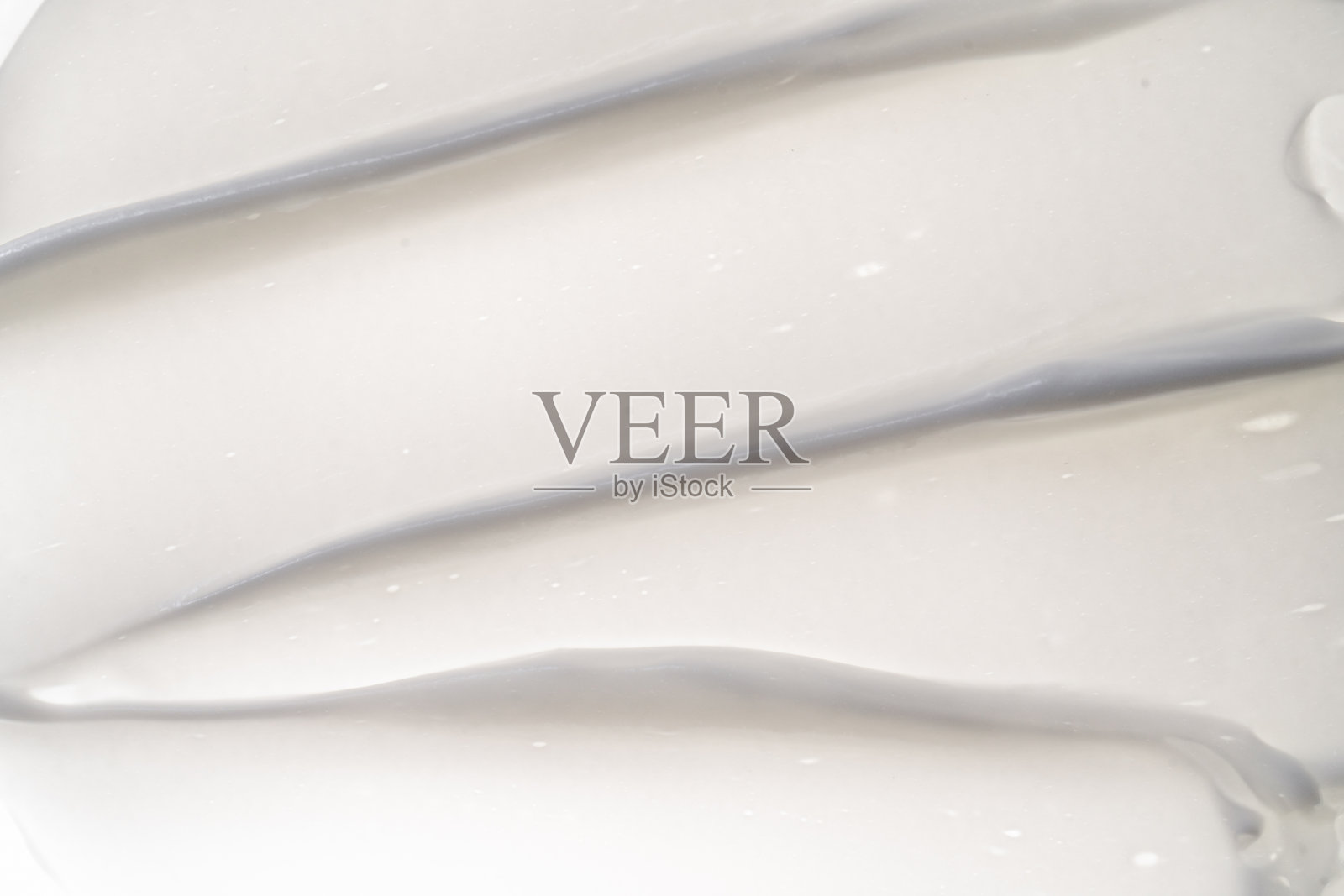 白色背景上的白色奶油纹理。照片摄影图片